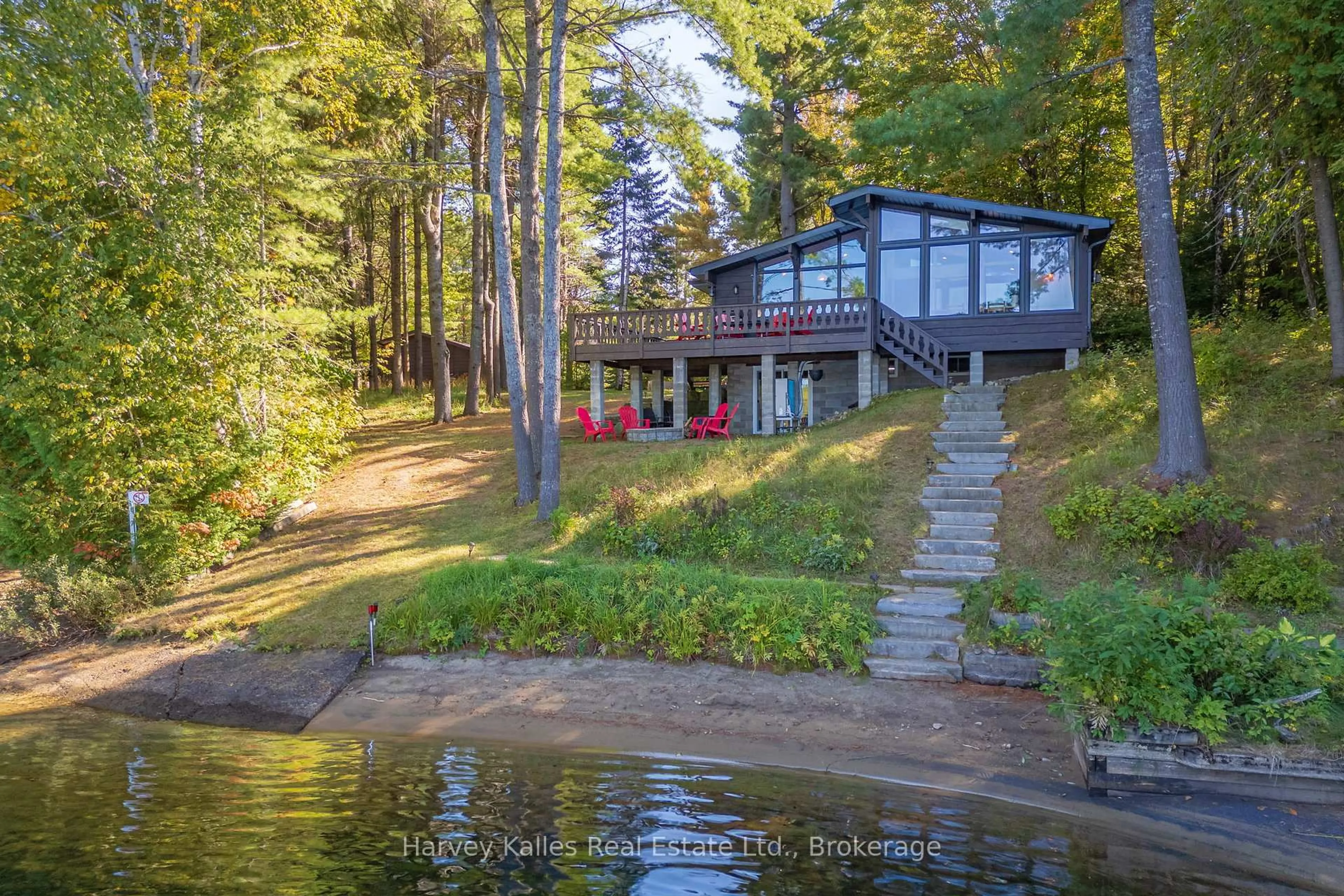 A pic from outside/outdoor area/front of a property/back of a property/a pic from drone, water/lake/river/ocean view for 1003 Hollow Rd, Algonquin Highlands Ontario P0A 1E0