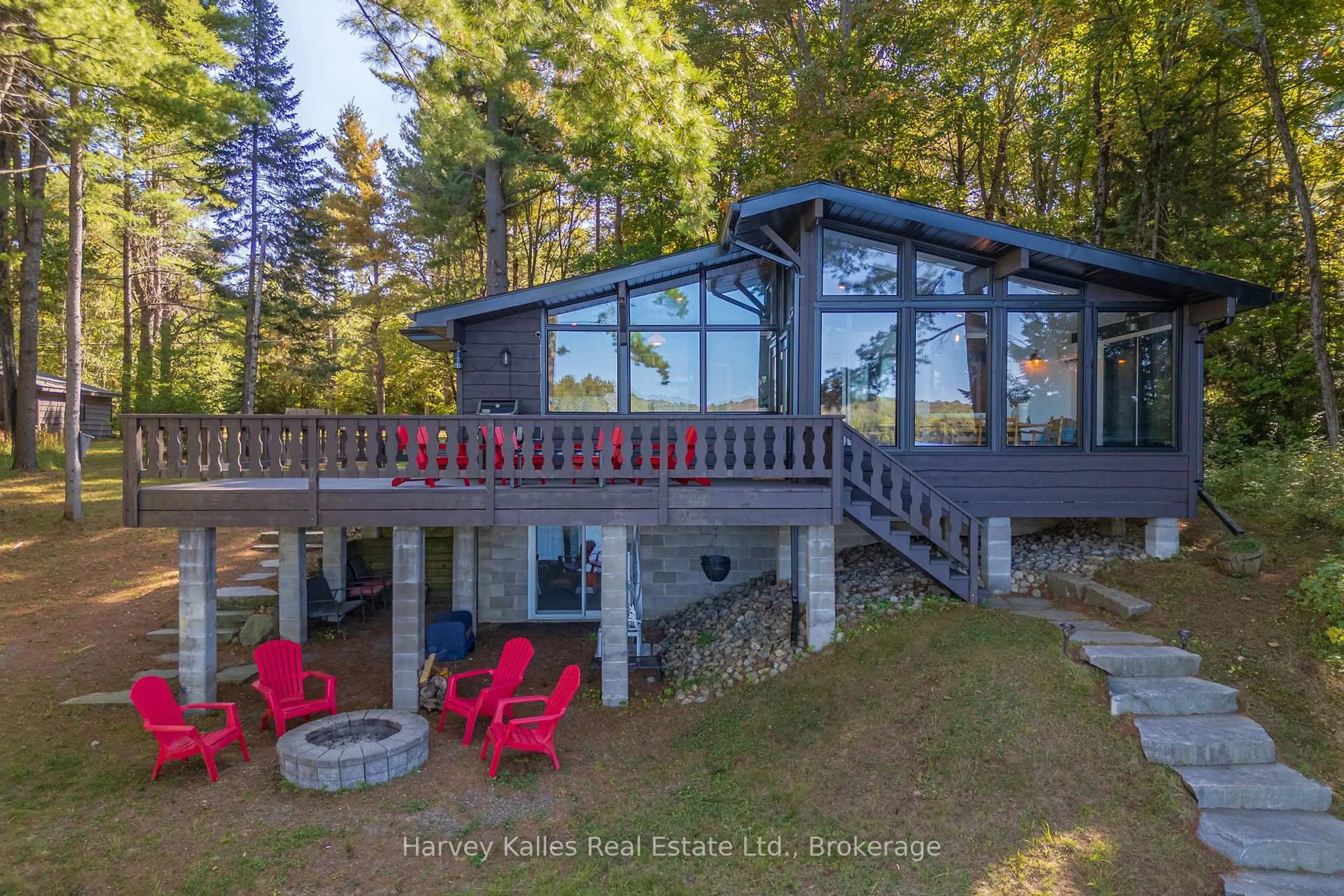 A pic from outside/outdoor area/front of a property/back of a property/a pic from drone, water/lake/river/ocean view for 1003 Hollow Rd, Algonquin Highlands Ontario P0A 1E0