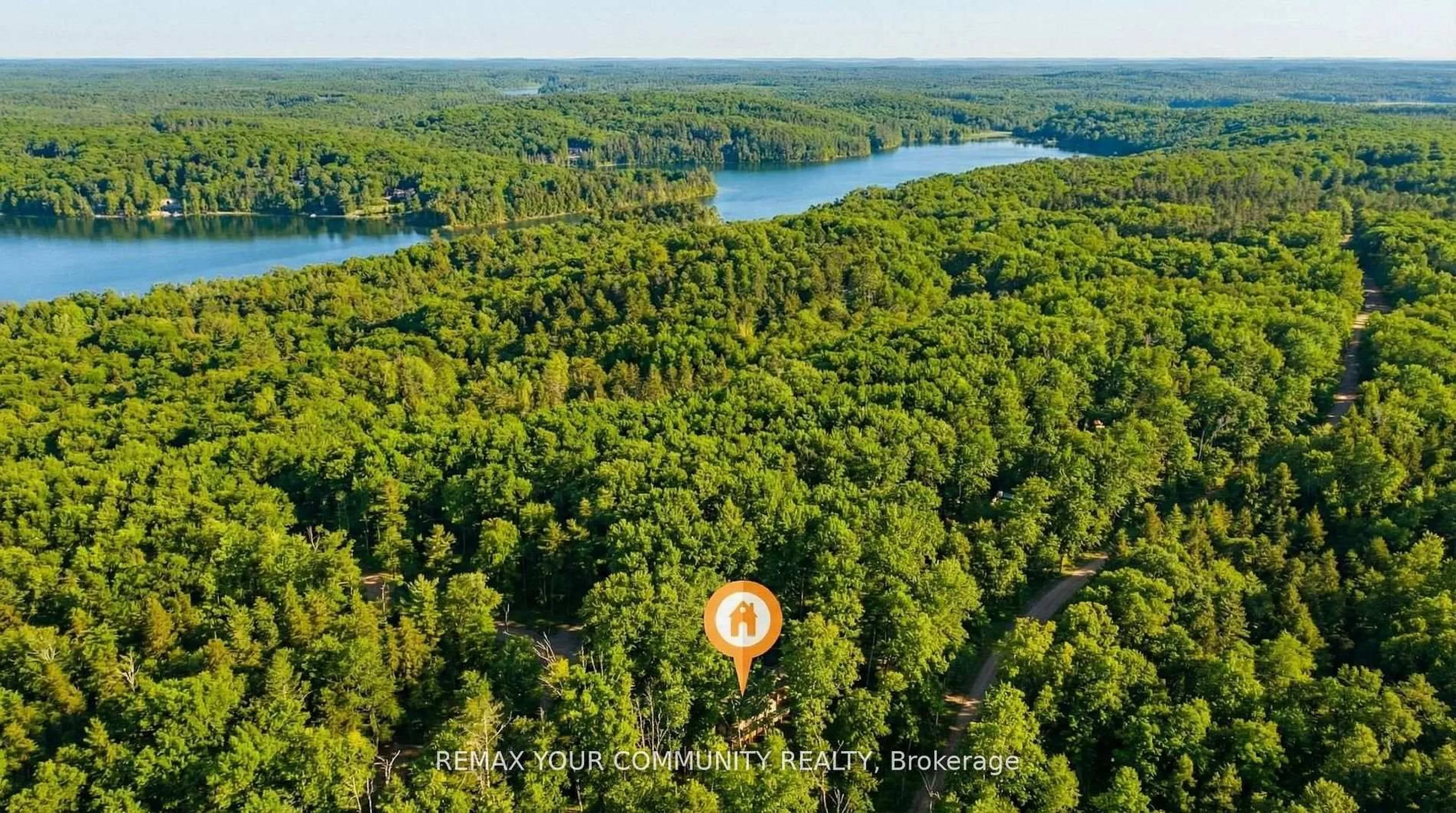 A pic from outside/outdoor area/front of a property/back of a property/a pic from drone, water/lake/river/ocean view for 1534 Salerno Lake Rd, Highlands East Ontario K0M 1X0