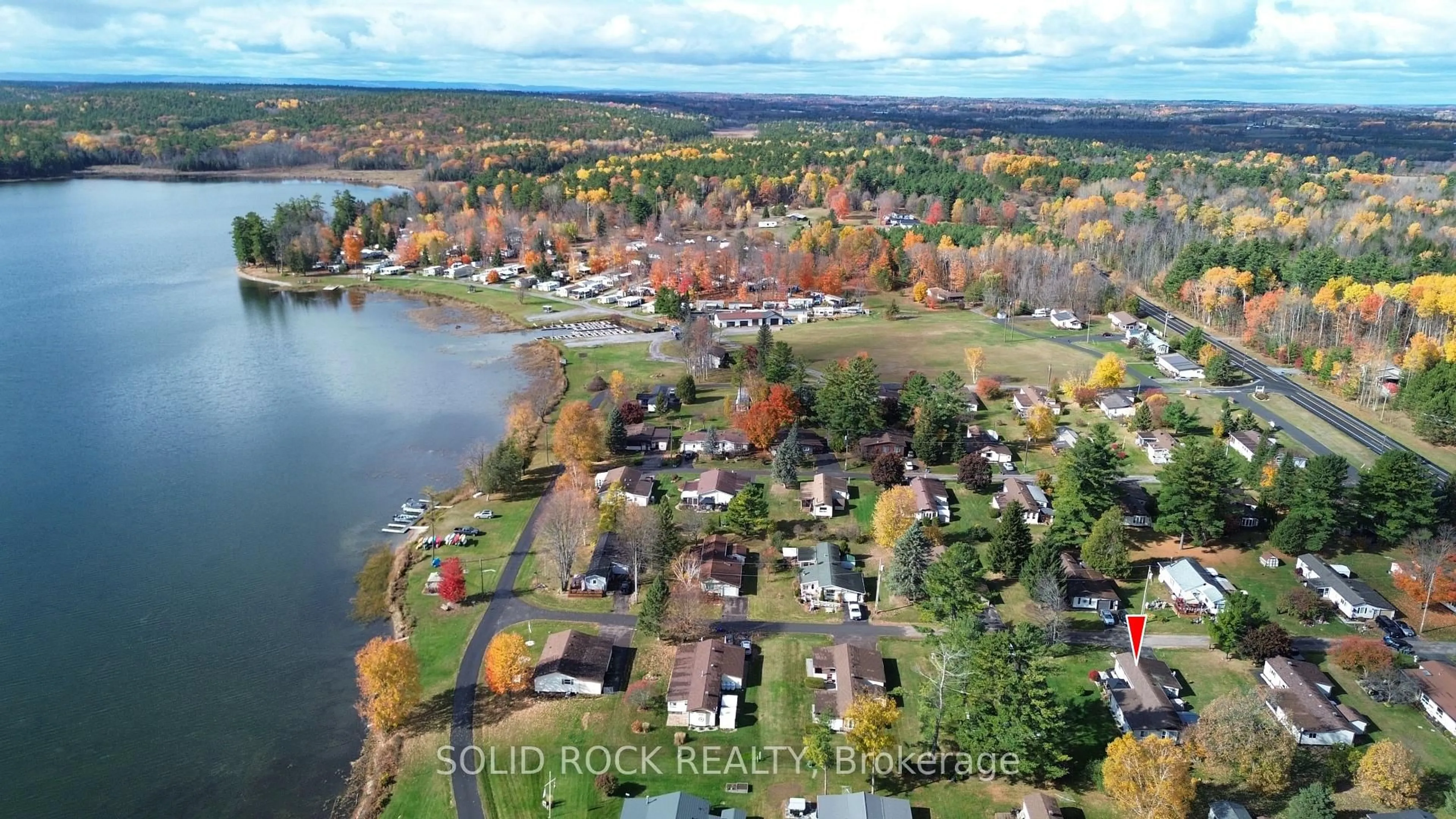 A pic from outside/outdoor area/front of a property/back of a property/a pic from drone, water/lake/river/ocean view for 26 Evergreen Lane, White Lake Ontario K0A 3L0