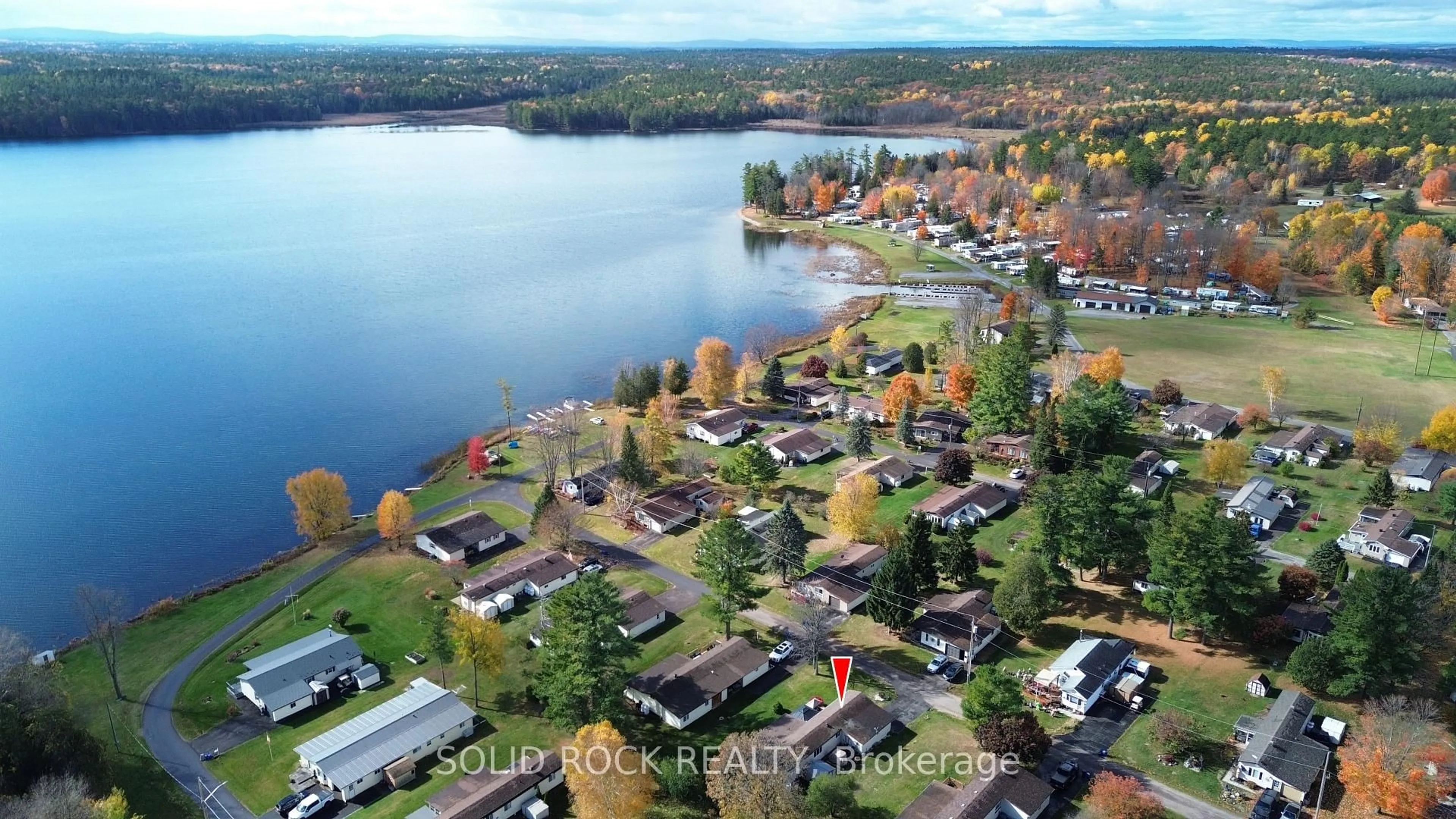 A pic from outside/outdoor area/front of a property/back of a property/a pic from drone, water/lake/river/ocean view for 26 Evergreen Lane, White Lake Ontario K0A 3L0