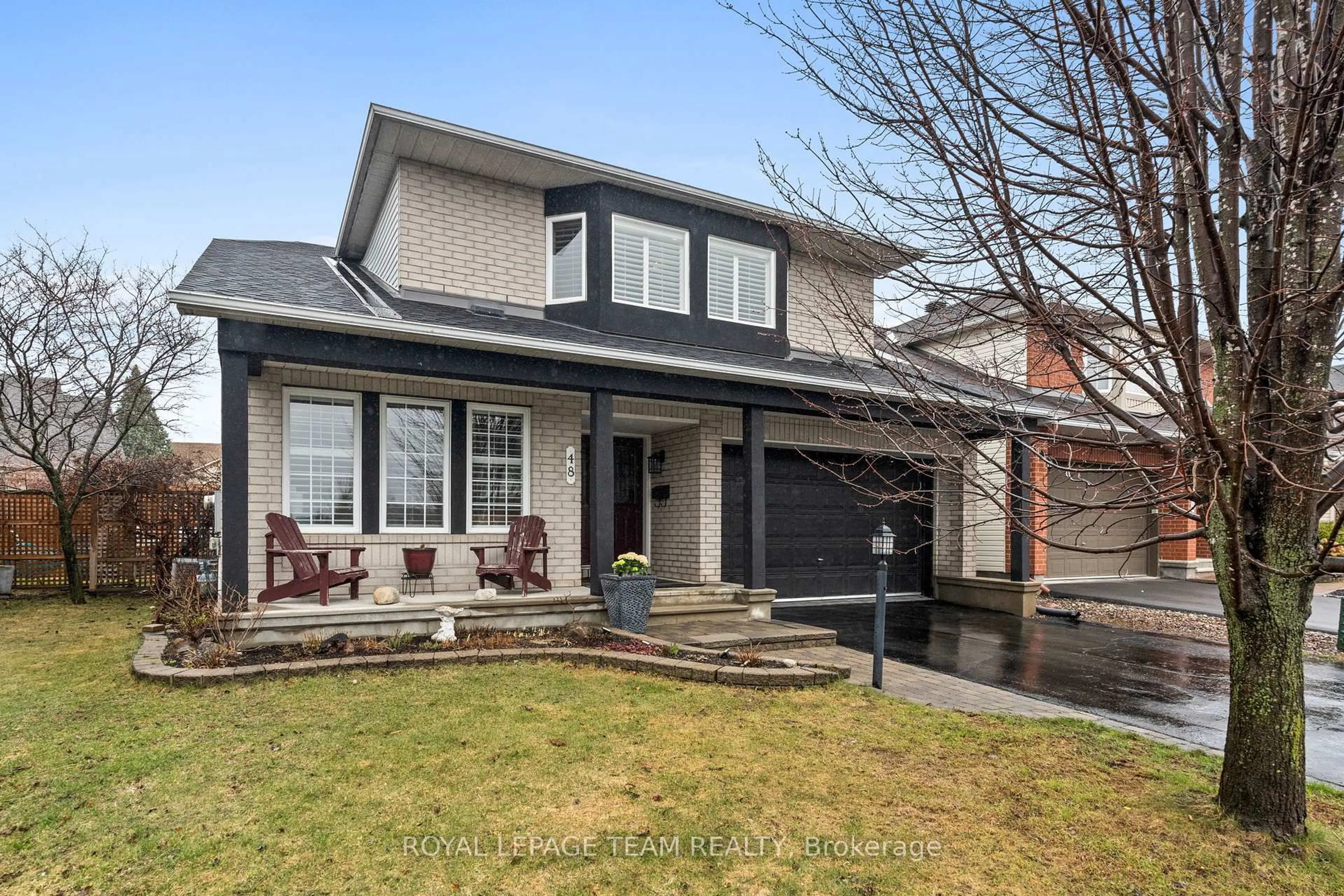 Home with brick exterior material, street for 48 Settler's Ridge Way, Ottawa Ontario K2J 4V2