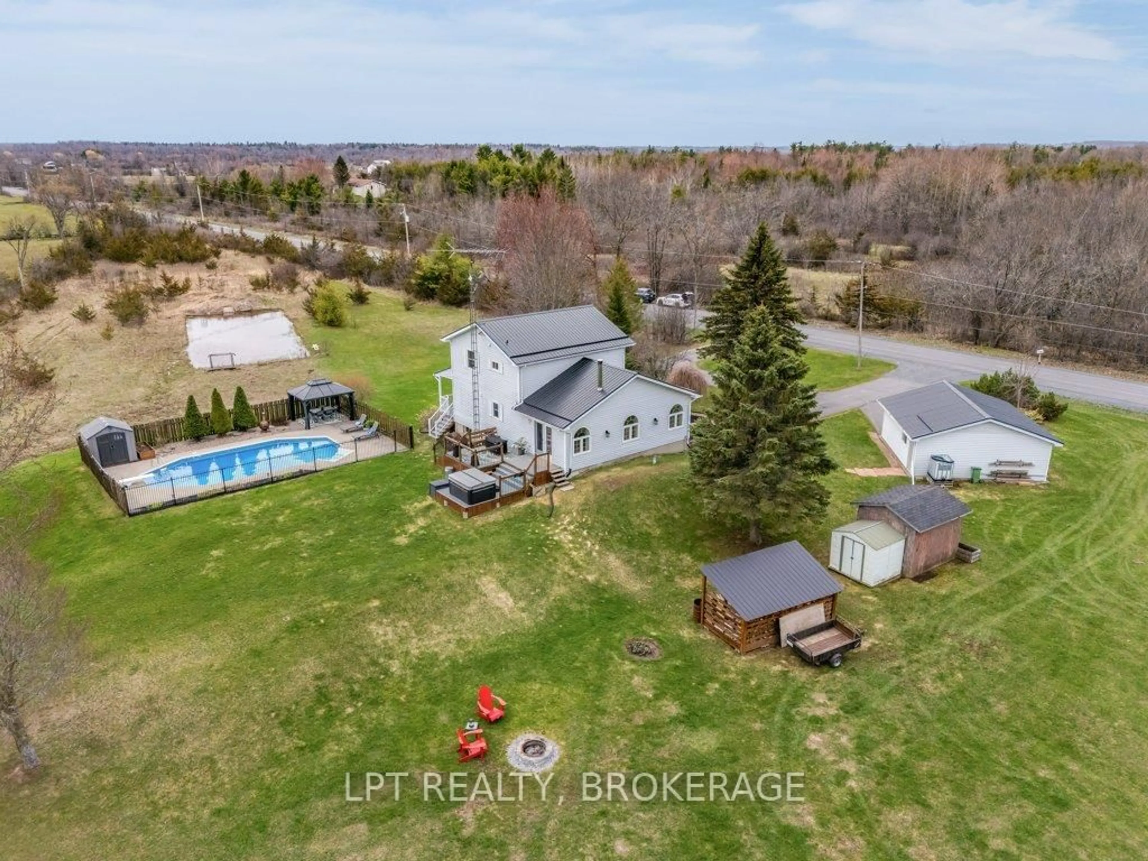 A pic from outside/outdoor area/front of a property/back of a property/a pic from drone, water/lake/river/ocean view for 4856 Florida Rd, Harrowsmith Ontario K0H 1V0