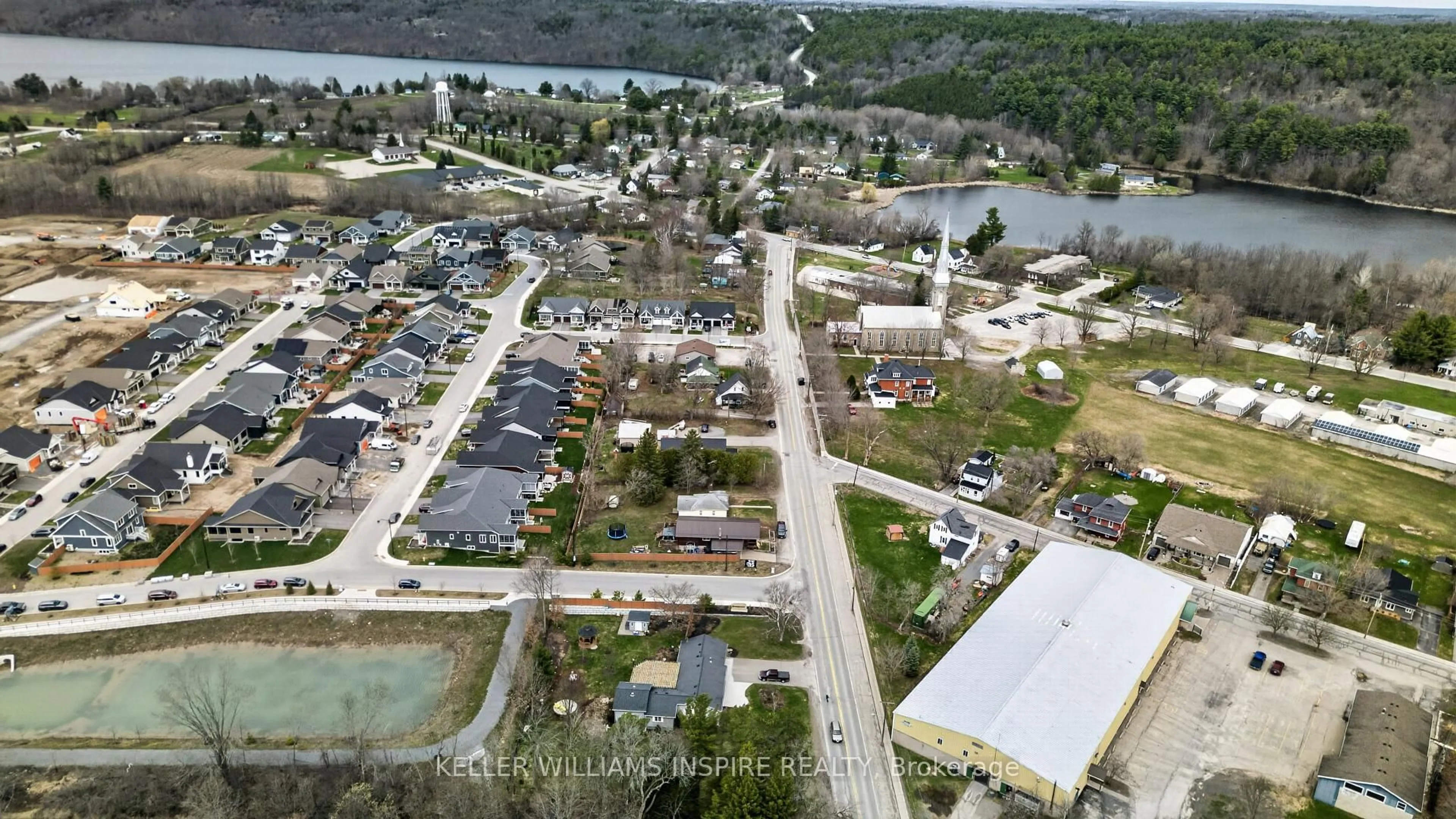 A pic from outside/outdoor area/front of a property/back of a property/a pic from drone, water/lake/river/ocean view for 22 Concession St, Westport Ontario K0G 1X0