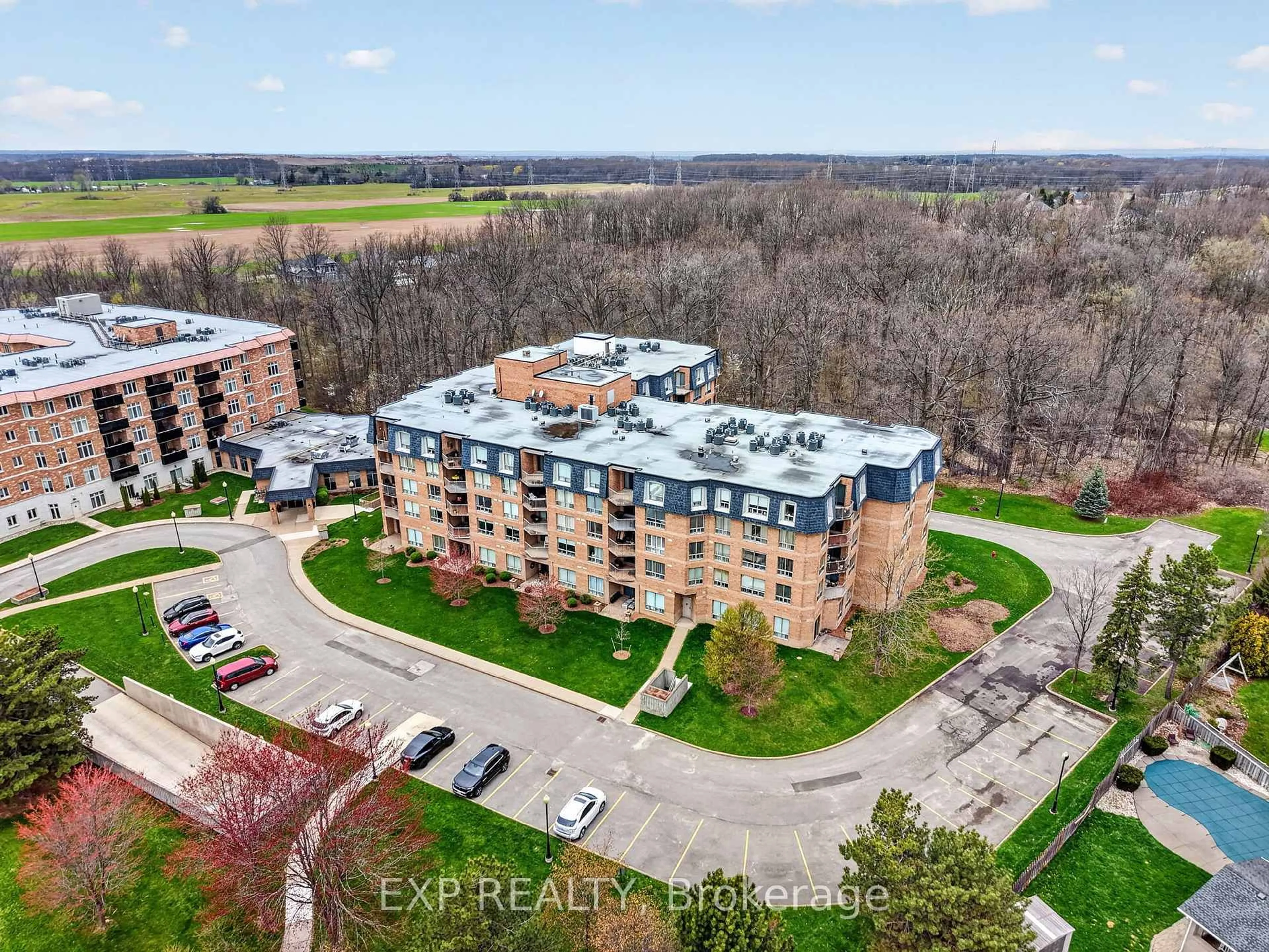 A pic from outside/outdoor area/front of a property/back of a property/a pic from drone, unknown for 8111 Forest Glen Dr #301, Niagara Falls Ontario L2H 2Y7