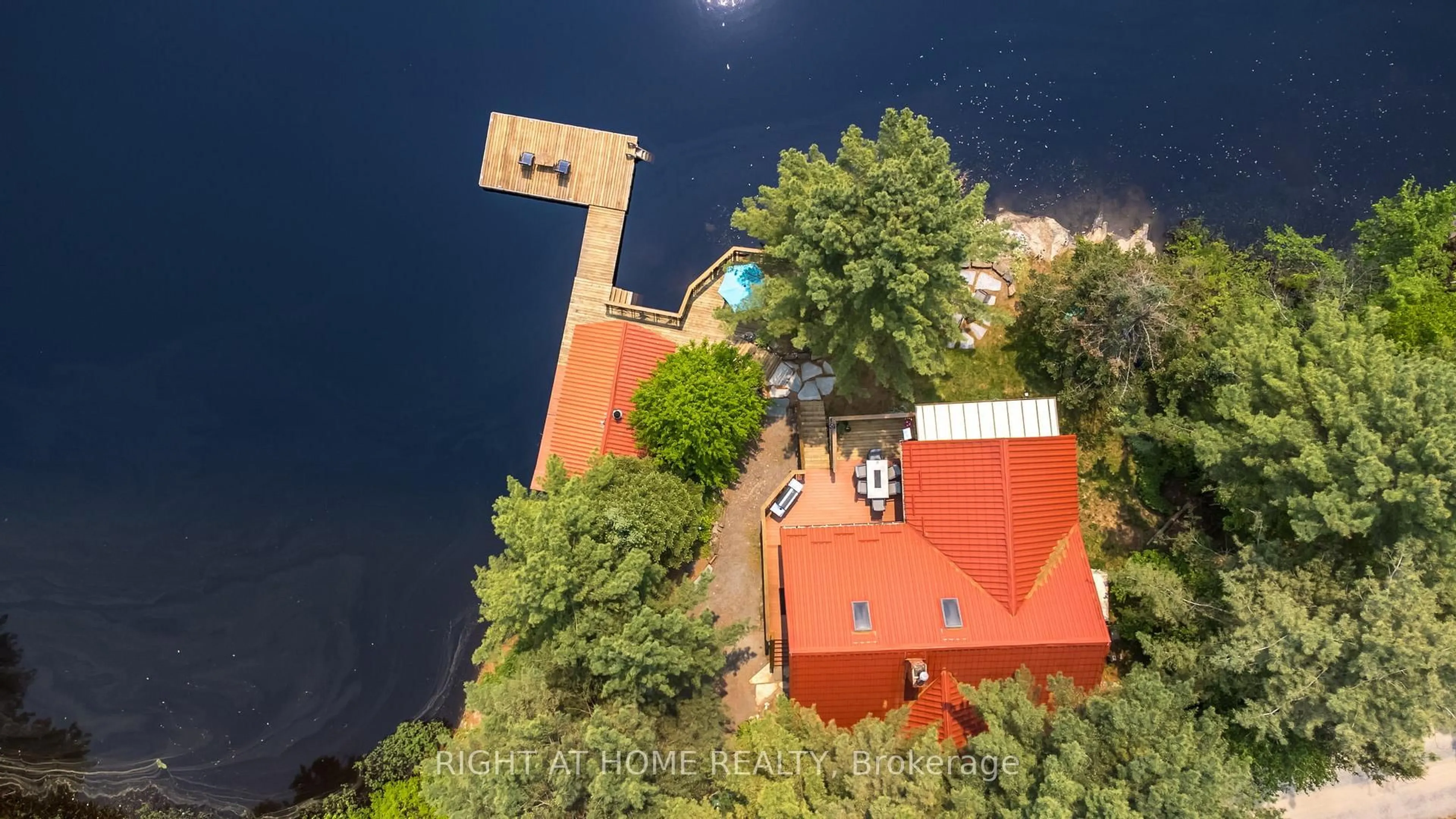 A pic from outside/outdoor area/front of a property/back of a property/a pic from drone, water/lake/river/ocean view for 235 LOCH ERNE Rd, McDougall Ontario P2A 2W7