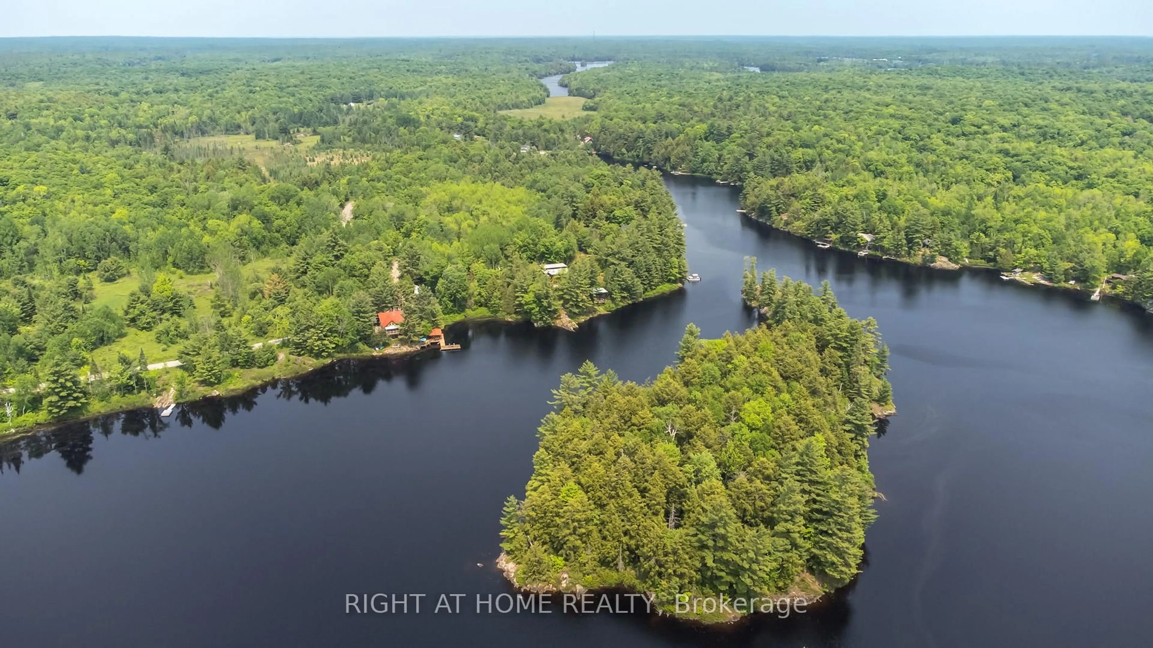 A pic from outside/outdoor area/front of a property/back of a property/a pic from drone, water/lake/river/ocean view for 235 LOCH ERNE Rd, McDougall Ontario P2A 2W7