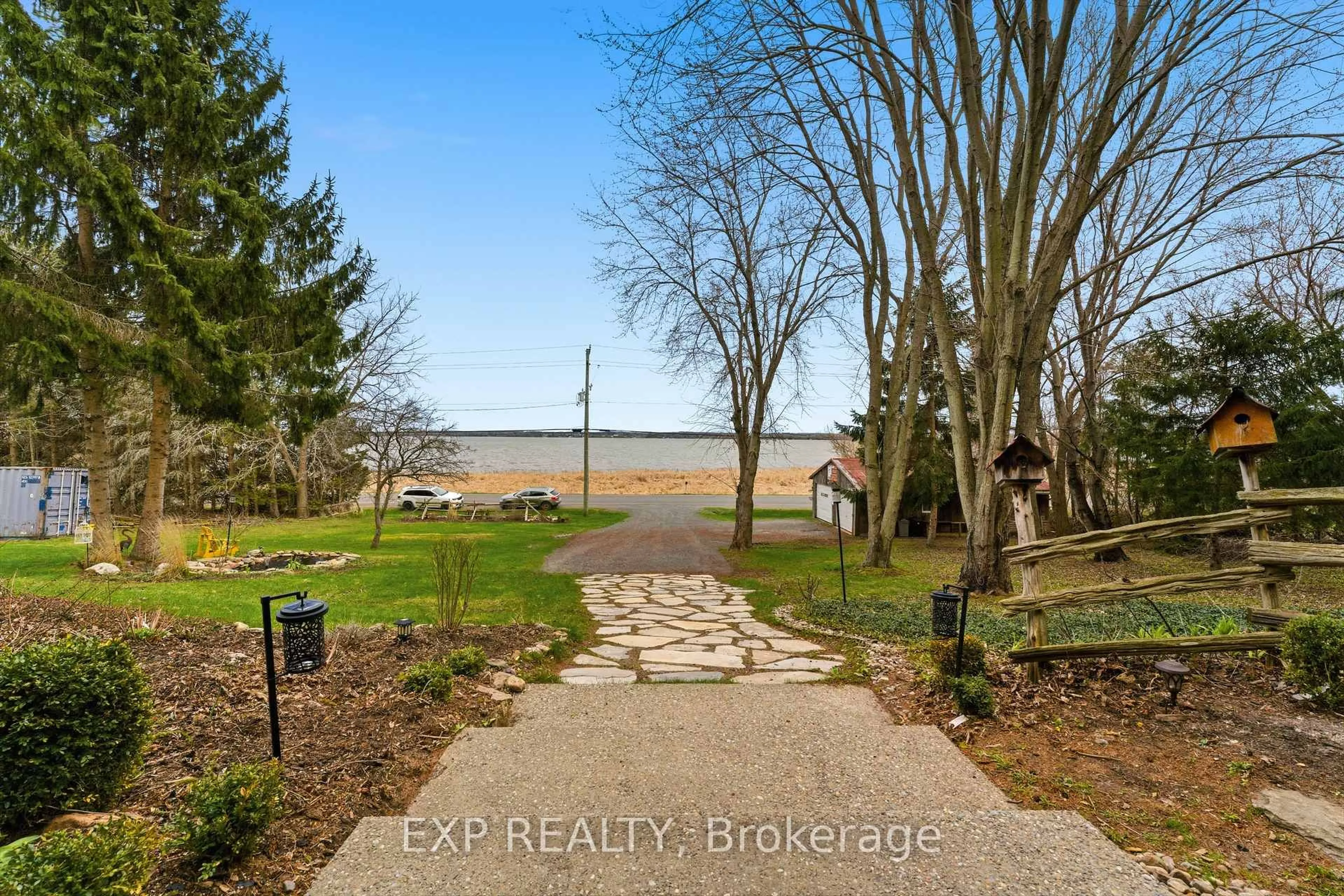 A pic from outside/outdoor area/front of a property/back of a property/a pic from drone, water/lake/river/ocean view for 6204 County Road 9 Rd, Napanee Ontario K7R 3K8