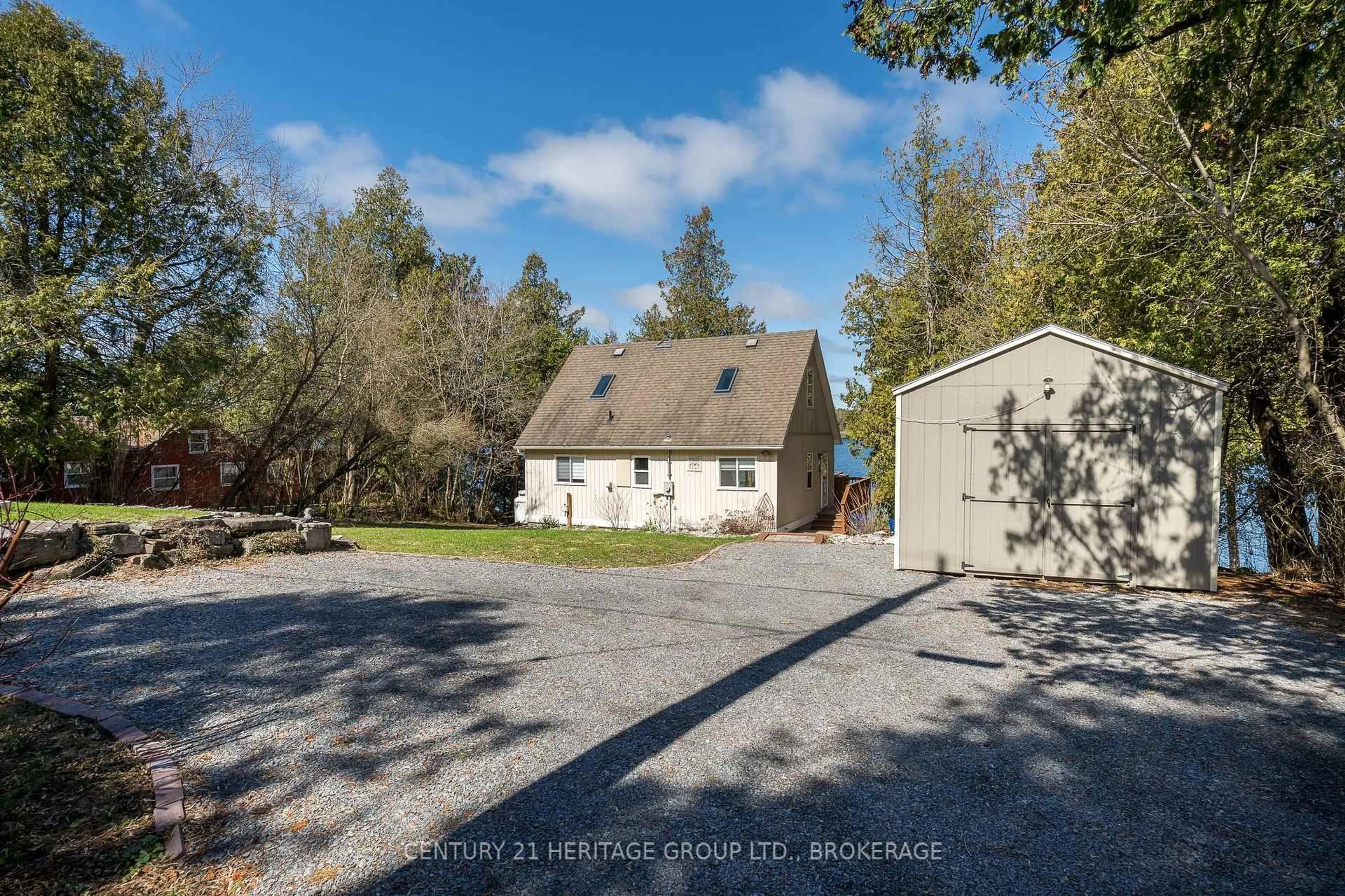 A pic from outside/outdoor area/front of a property/back of a property/a pic from drone, street for 5064 Cedar Ridges Rd, Inverary Ontario K0H 1X0