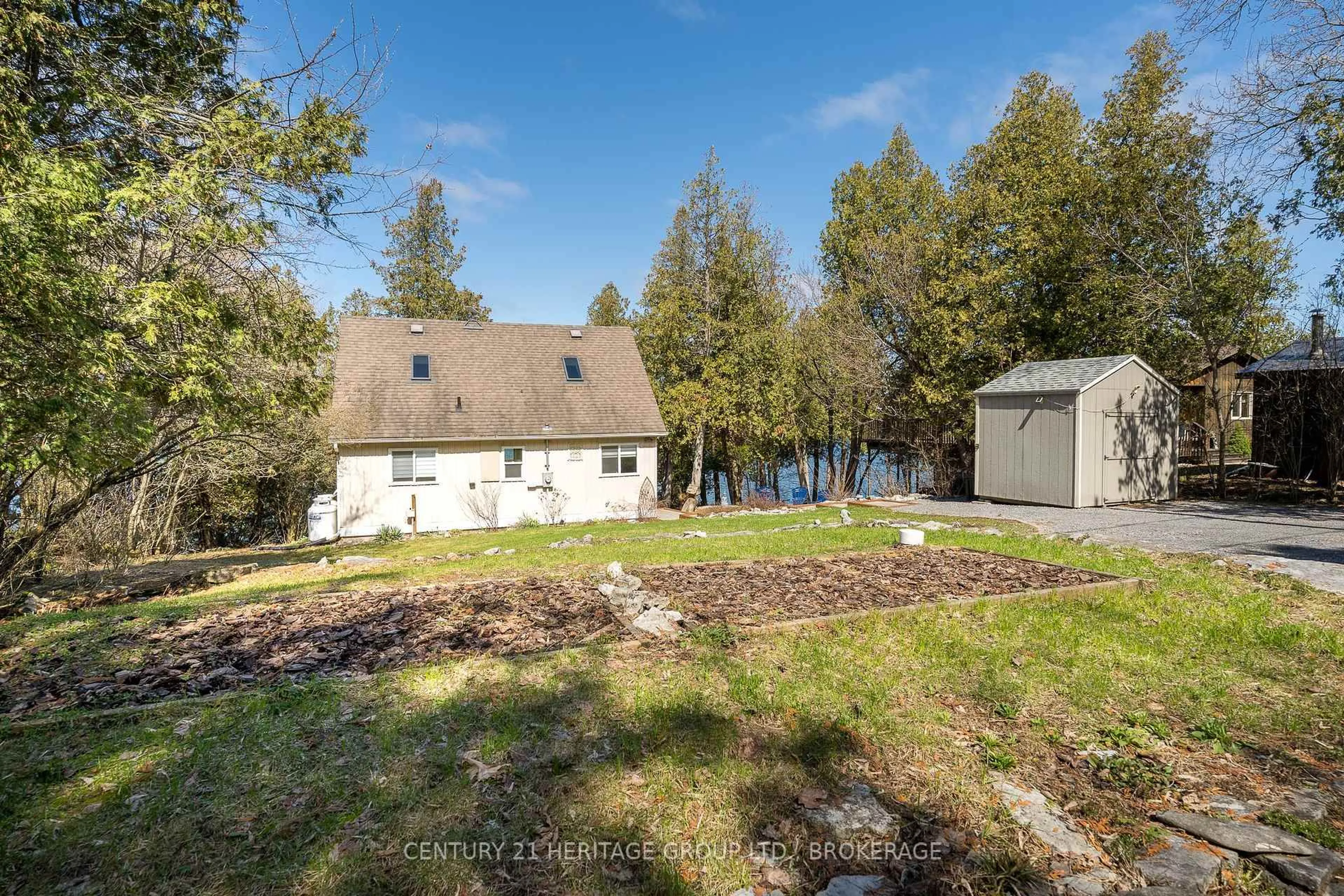 A pic from outside/outdoor area/front of a property/back of a property/a pic from drone, water/lake/river/ocean view for 5064 Cedar Ridges Rd, Inverary Ontario K0H 1X0