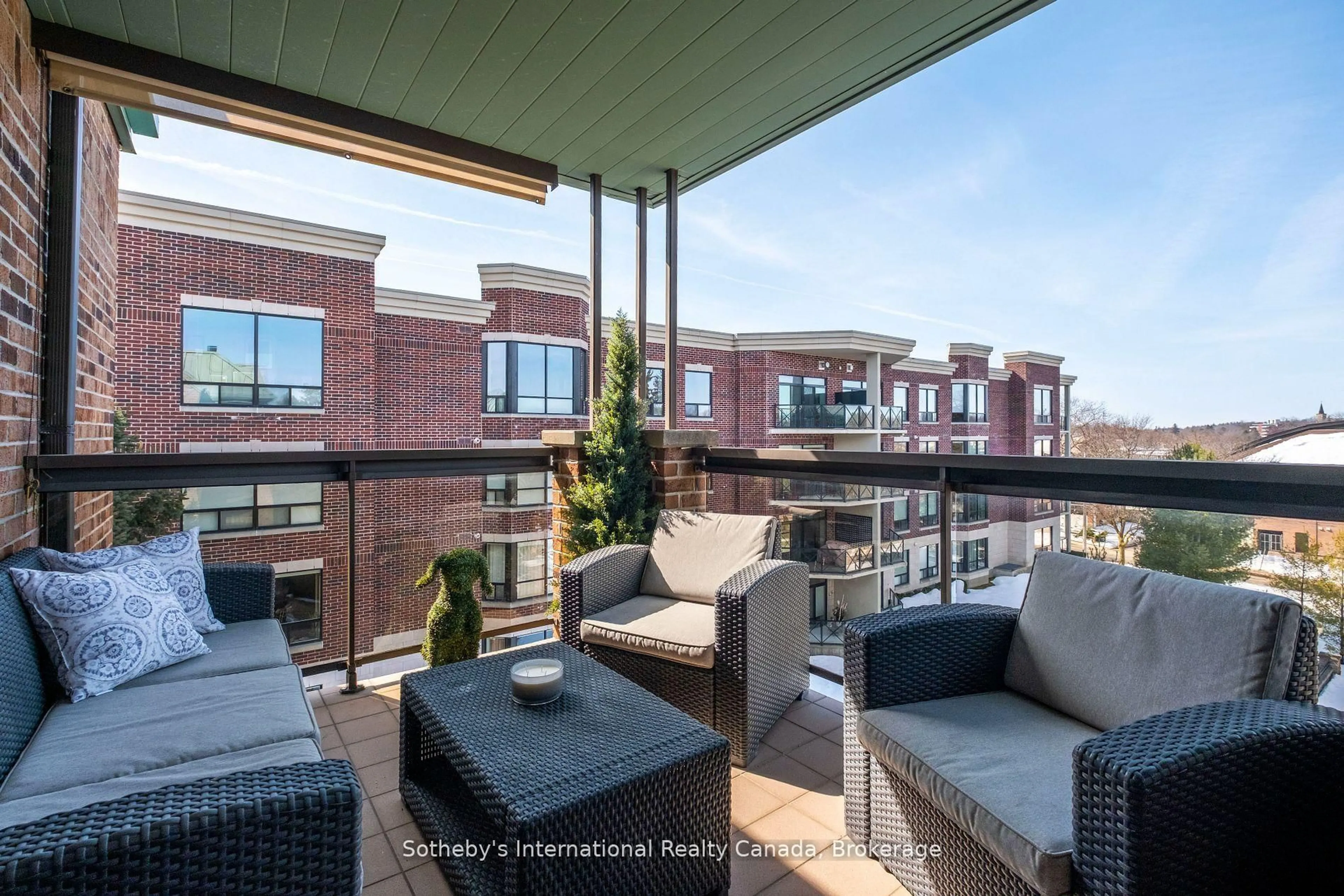 Patio, city buildings view from balcony for 30 Front St #401, Stratford Ontario N5A 7S3