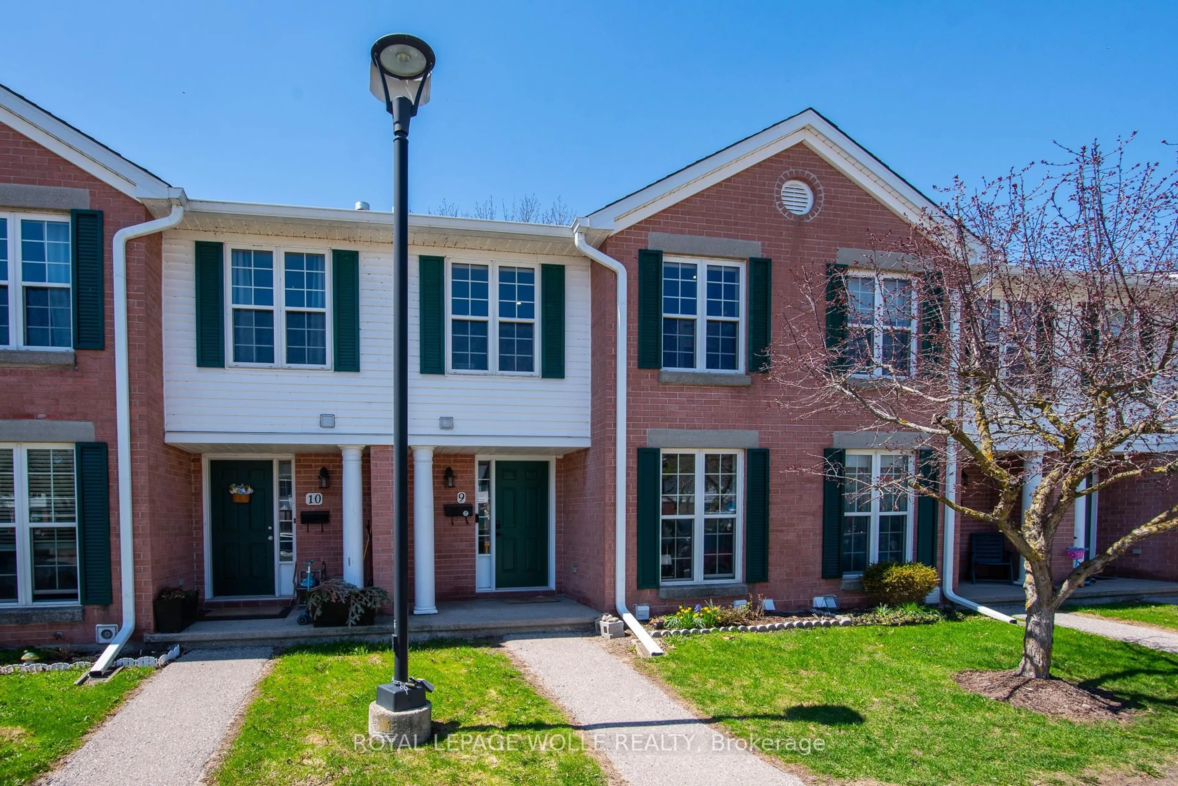 Home with brick exterior material, street for 465 Woolwich St #9, Waterloo Ontario N2K 3S4