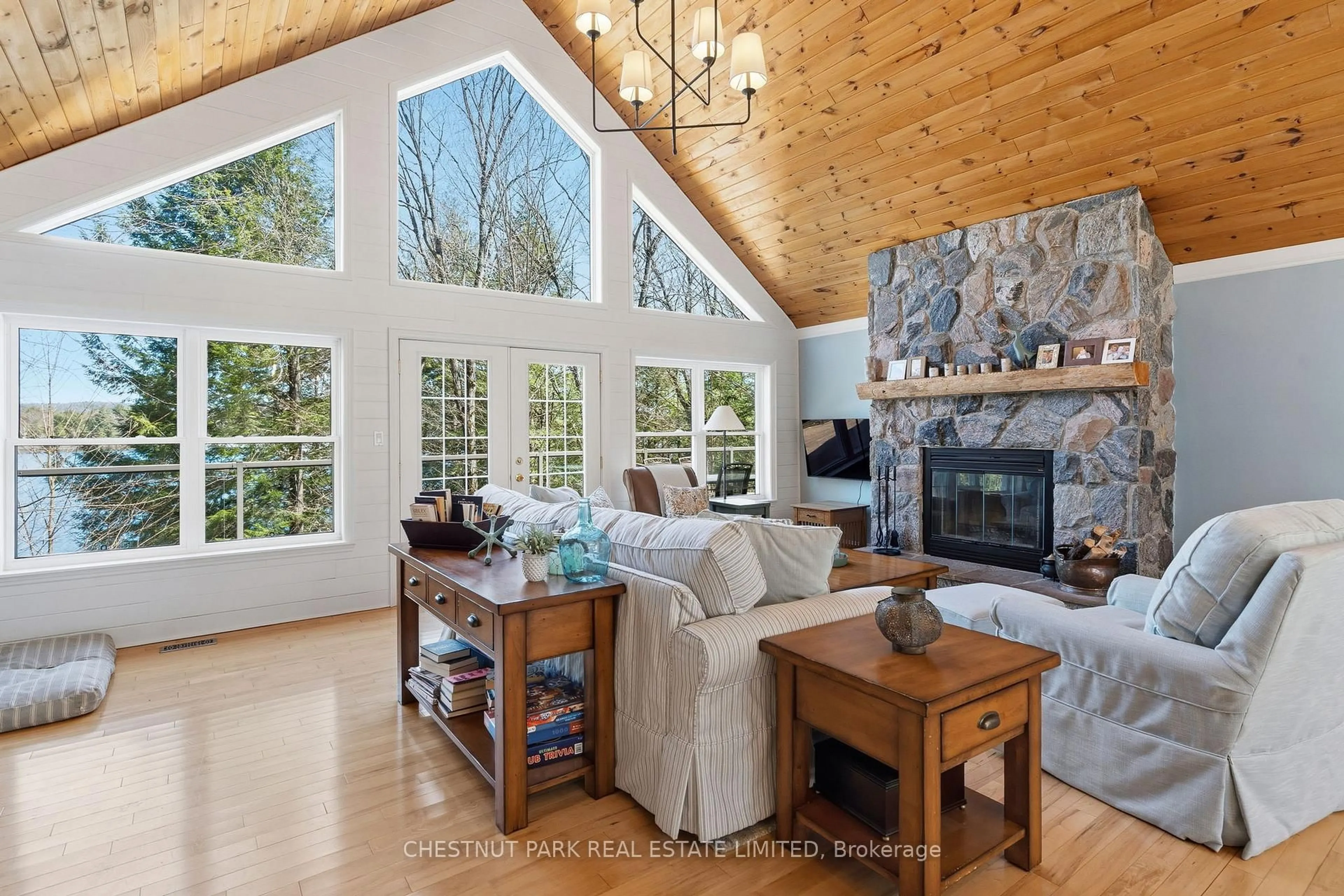 Living room with furniture, wood/laminate floor for 1018 Rattlesnake Rd, Dysart et al Ontario K0M 1S0
