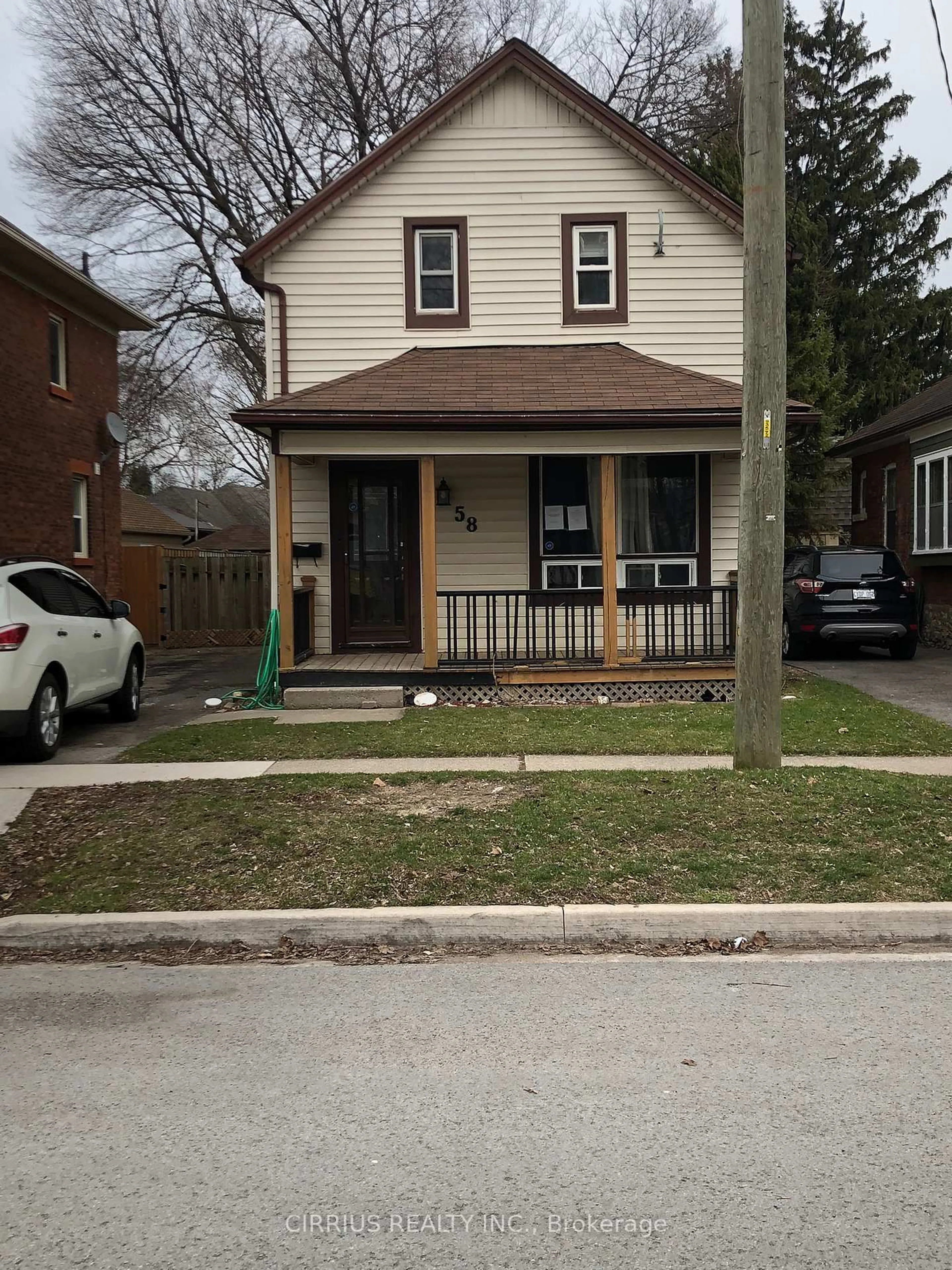 Home with brick exterior material, street for 58 Woodland Ave, St. Catharines Ontario L2R 5A3
