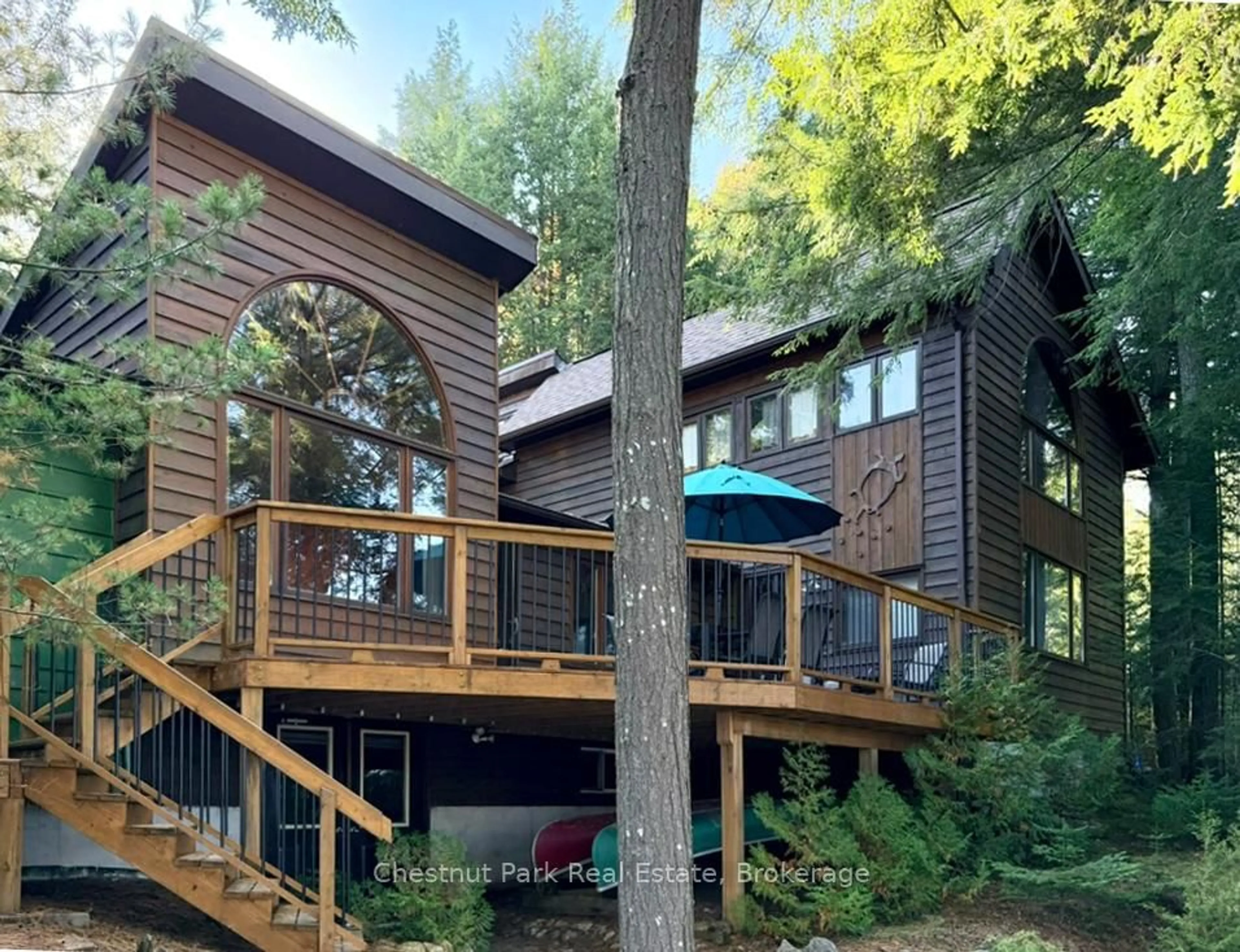 Home with vinyl exterior material, forest/trees view for 1062 Elmhurst Lane, Dysart et al Ontario K0M 1S0