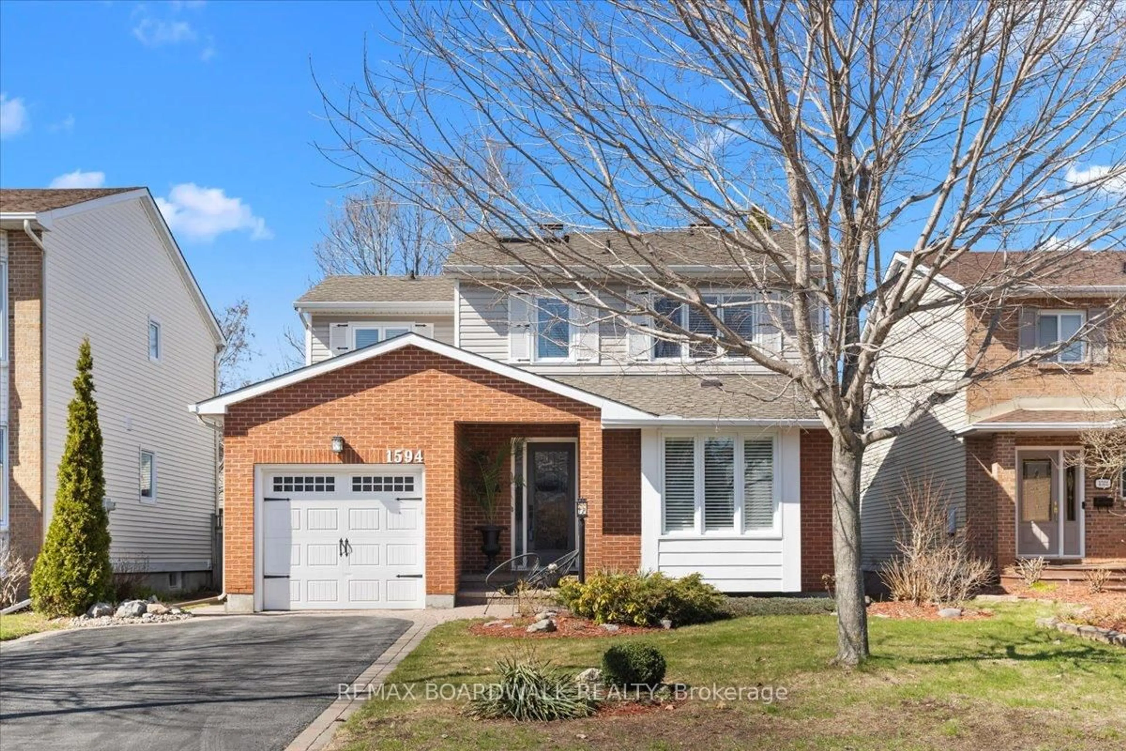 Home with brick exterior material, street for 1594 Meadowfield Pl, Orleans Ontario K1C 5V6