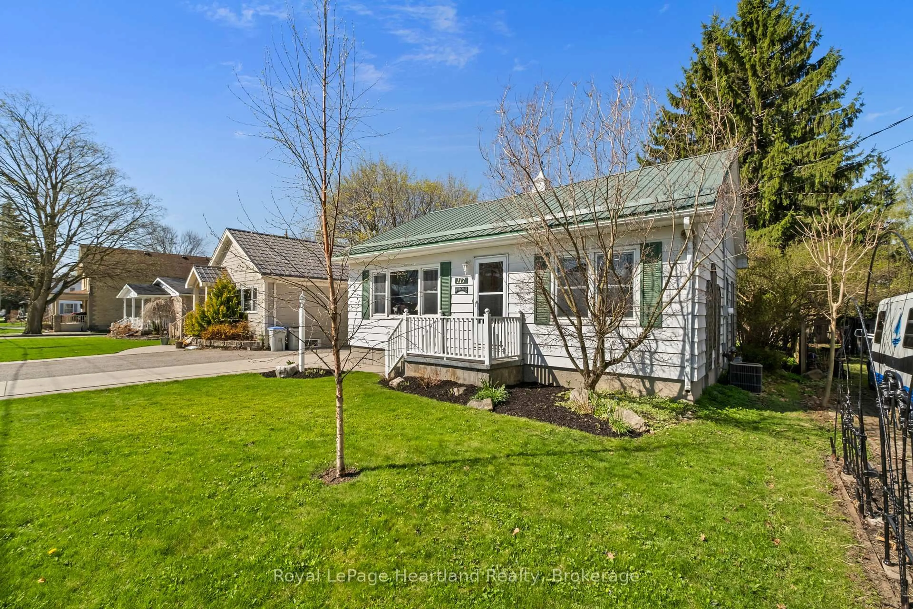 Home with vinyl exterior material, street for 117 Andrew St, South Huron Ontario N0M 1S1