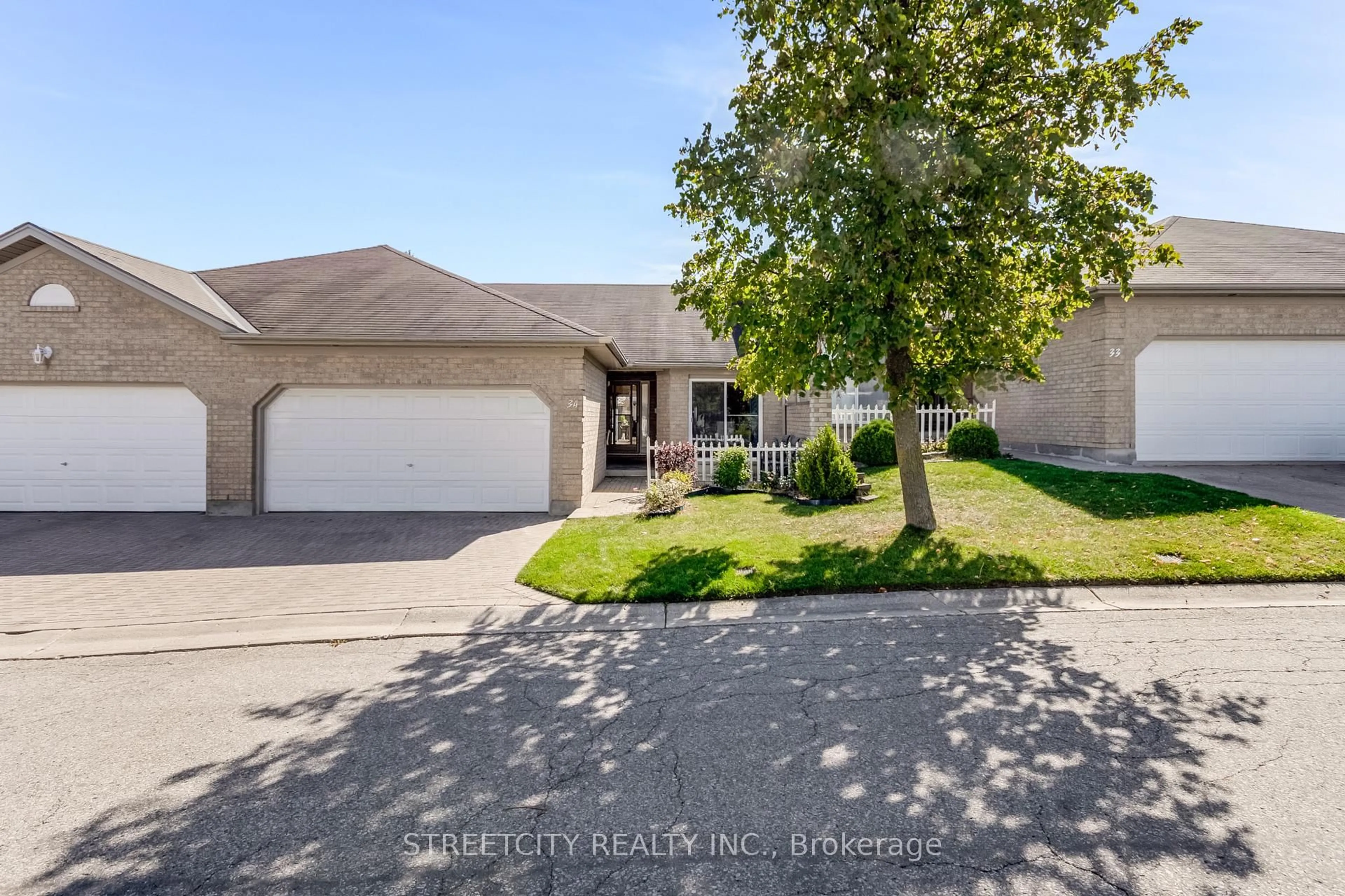 A pic from outside/outdoor area/front of a property/back of a property/a pic from drone, street for 861 Shelborne St #34, London South Ontario N5Z 5C5