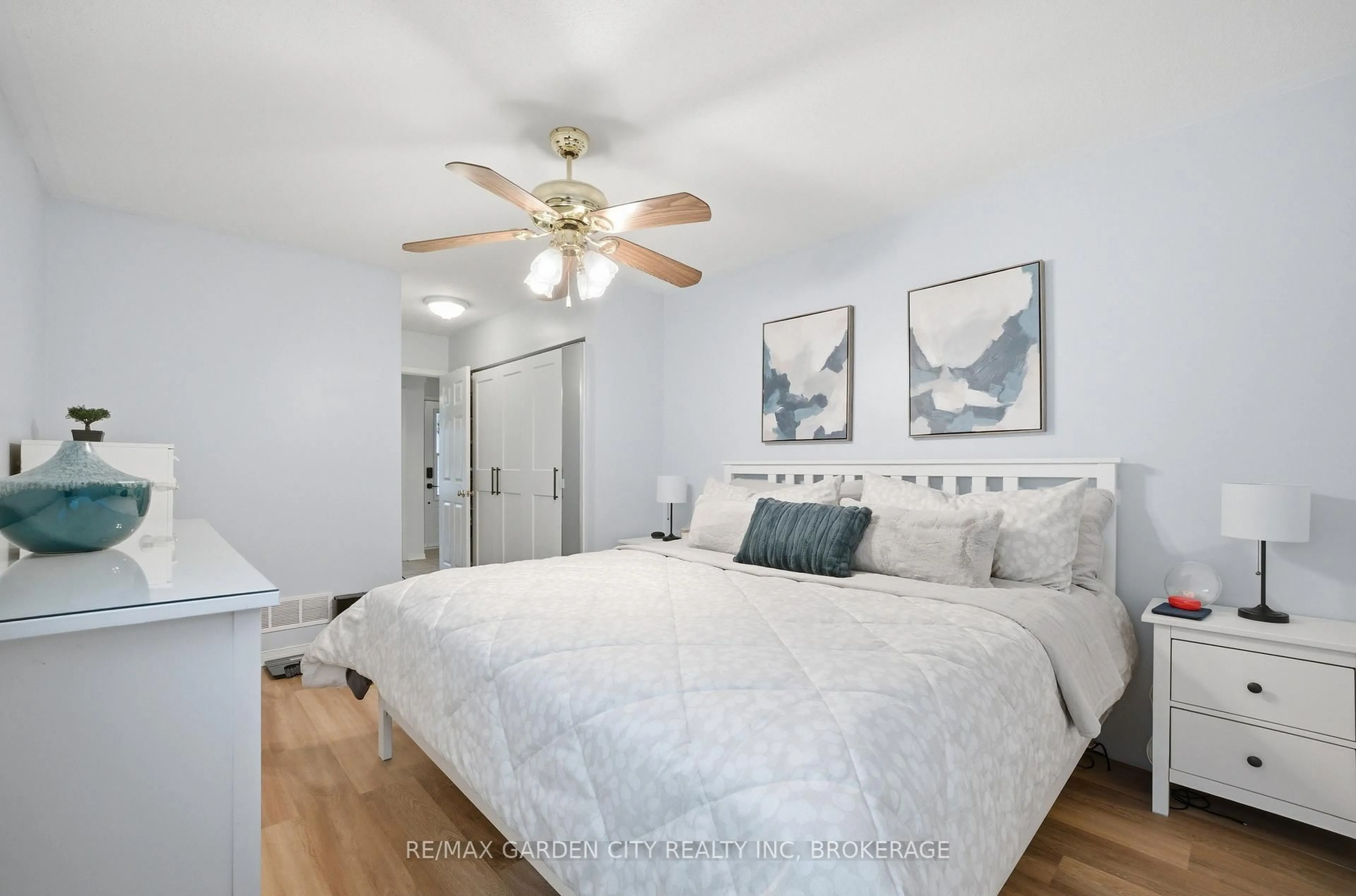 Bedroom with bed, wood/laminate floor for 42 Jackson Crt, Welland Ontario L3C 7G2