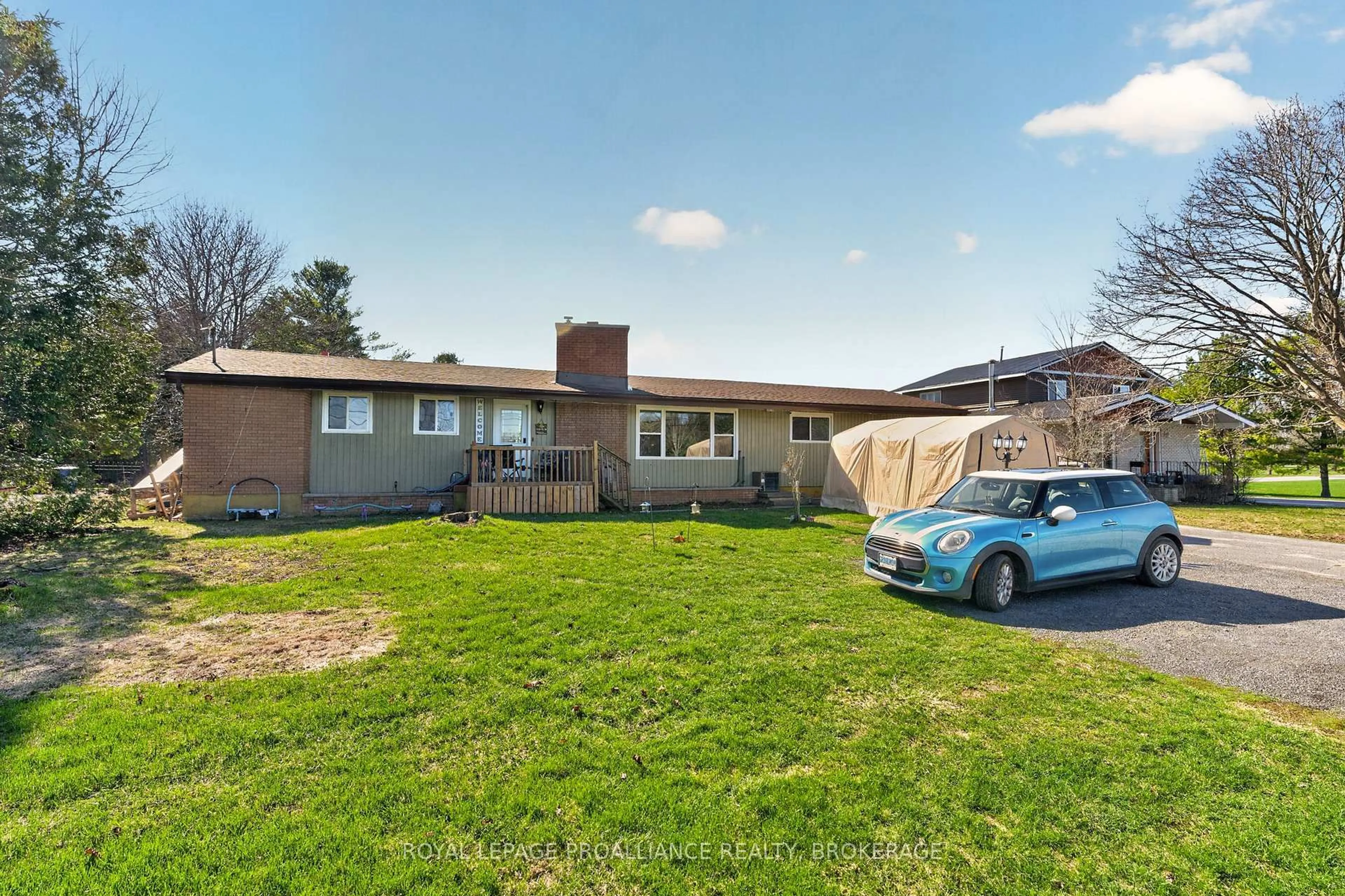 A pic from outside/outdoor area/front of a property/back of a property/a pic from drone, street for 2499 Perth Rd, Kingston Ontario K0H 1S0