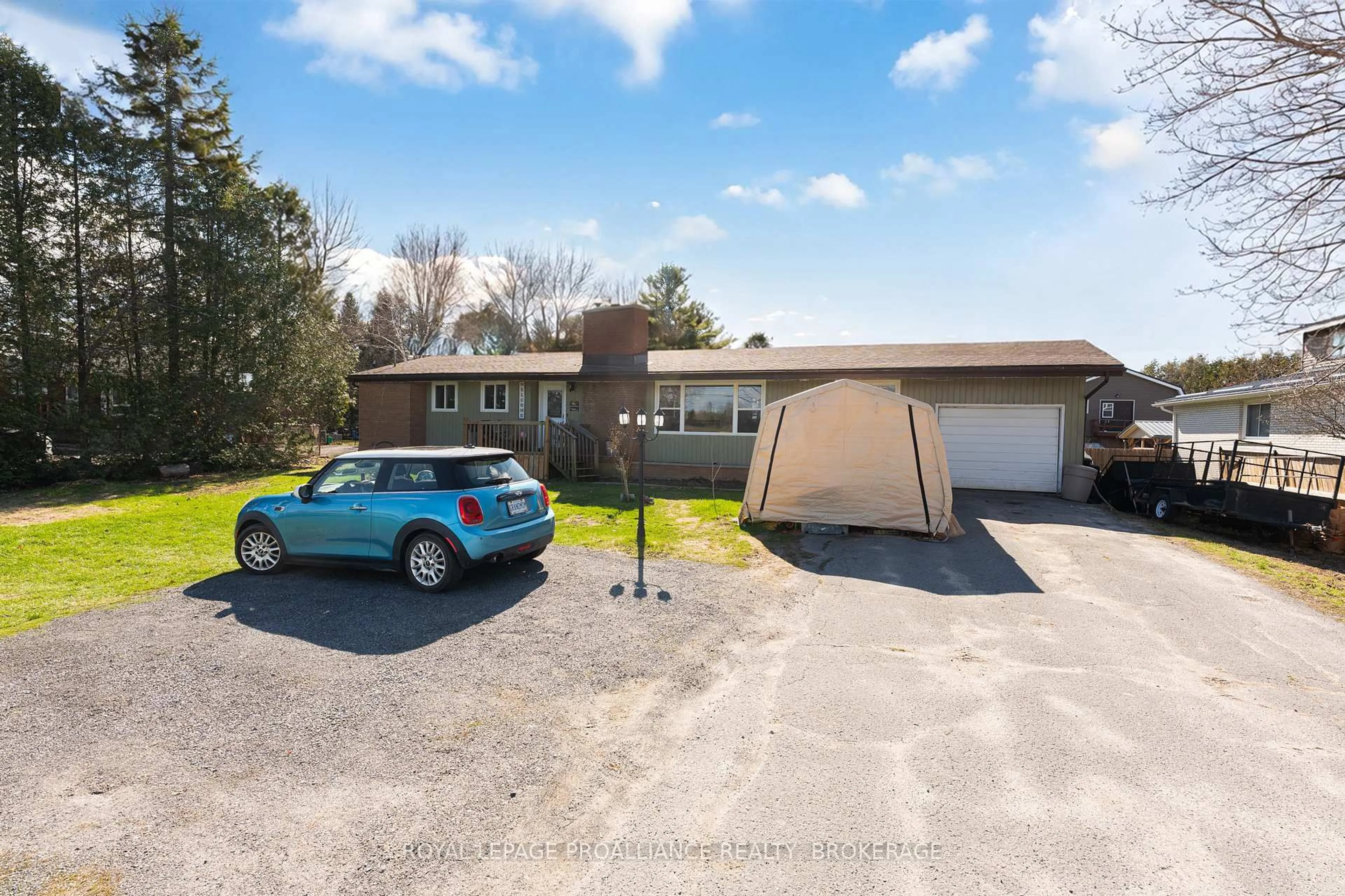 A pic from outside/outdoor area/front of a property/back of a property/a pic from drone, street for 2499 Perth Rd, Kingston Ontario K0H 1S0