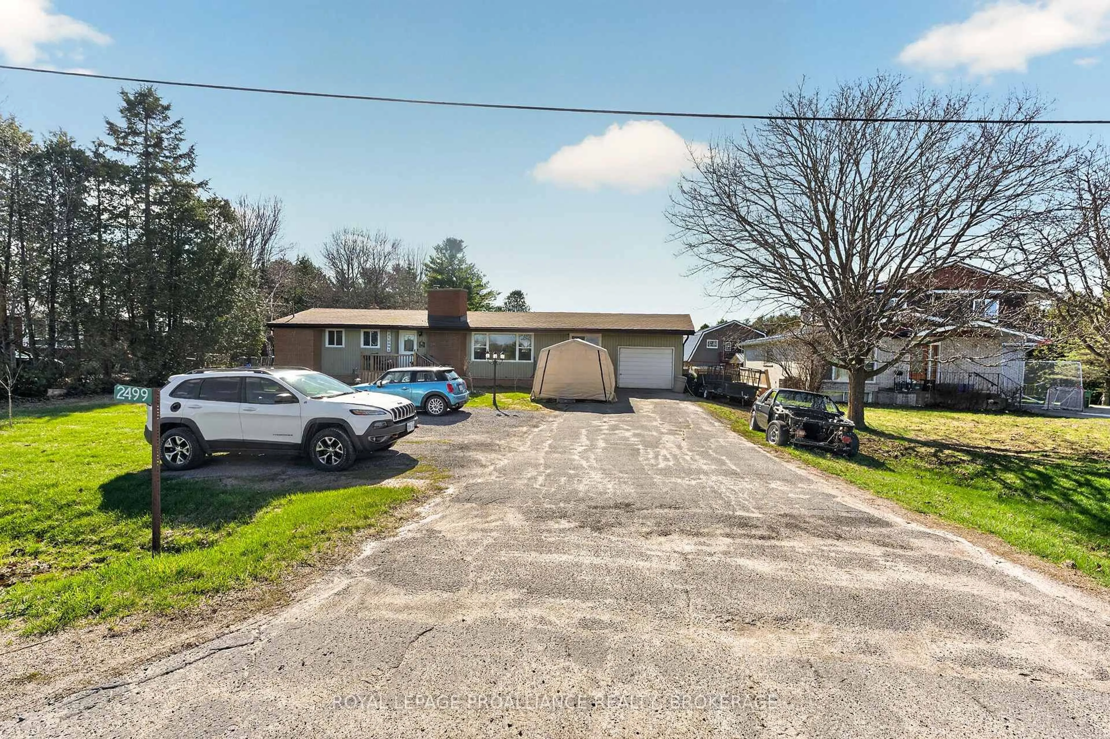 A pic from outside/outdoor area/front of a property/back of a property/a pic from drone, street for 2499 Perth Rd, Kingston Ontario K0H 1S0