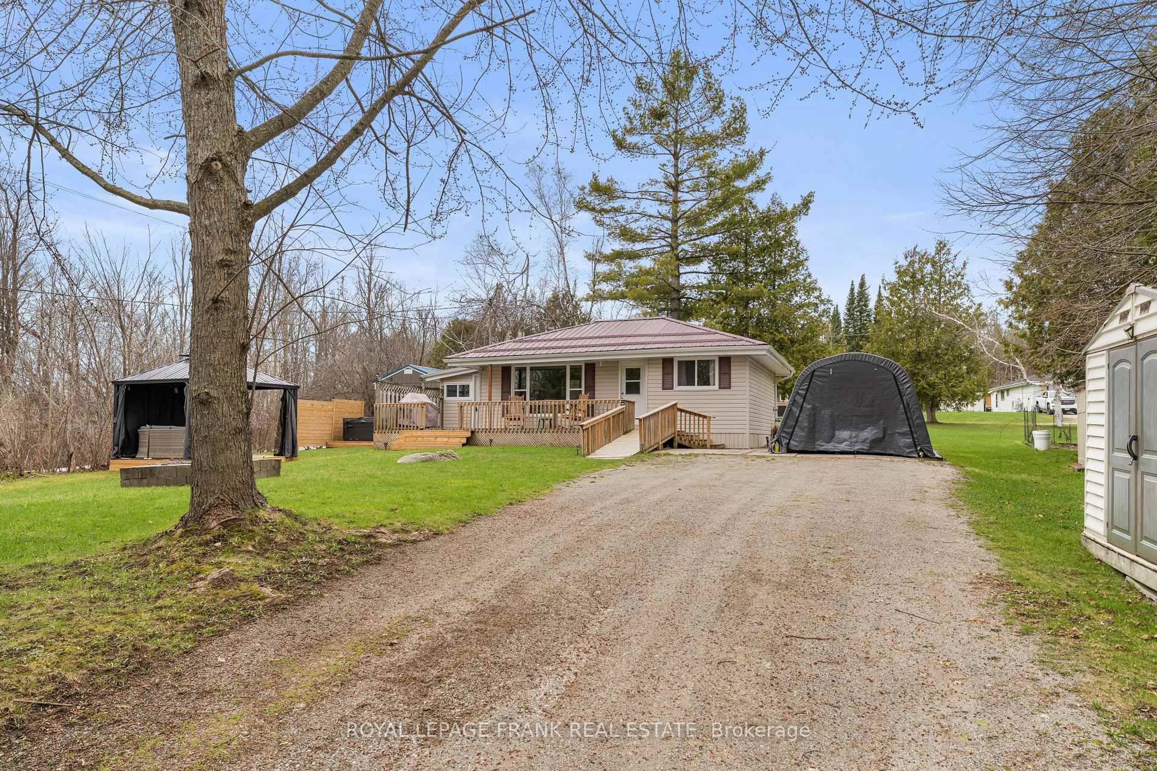 A pic from outside/outdoor area/front of a property/back of a property/a pic from drone, street for 203 Crosby Dr, Kawartha Lakes Ontario K0M 1A0