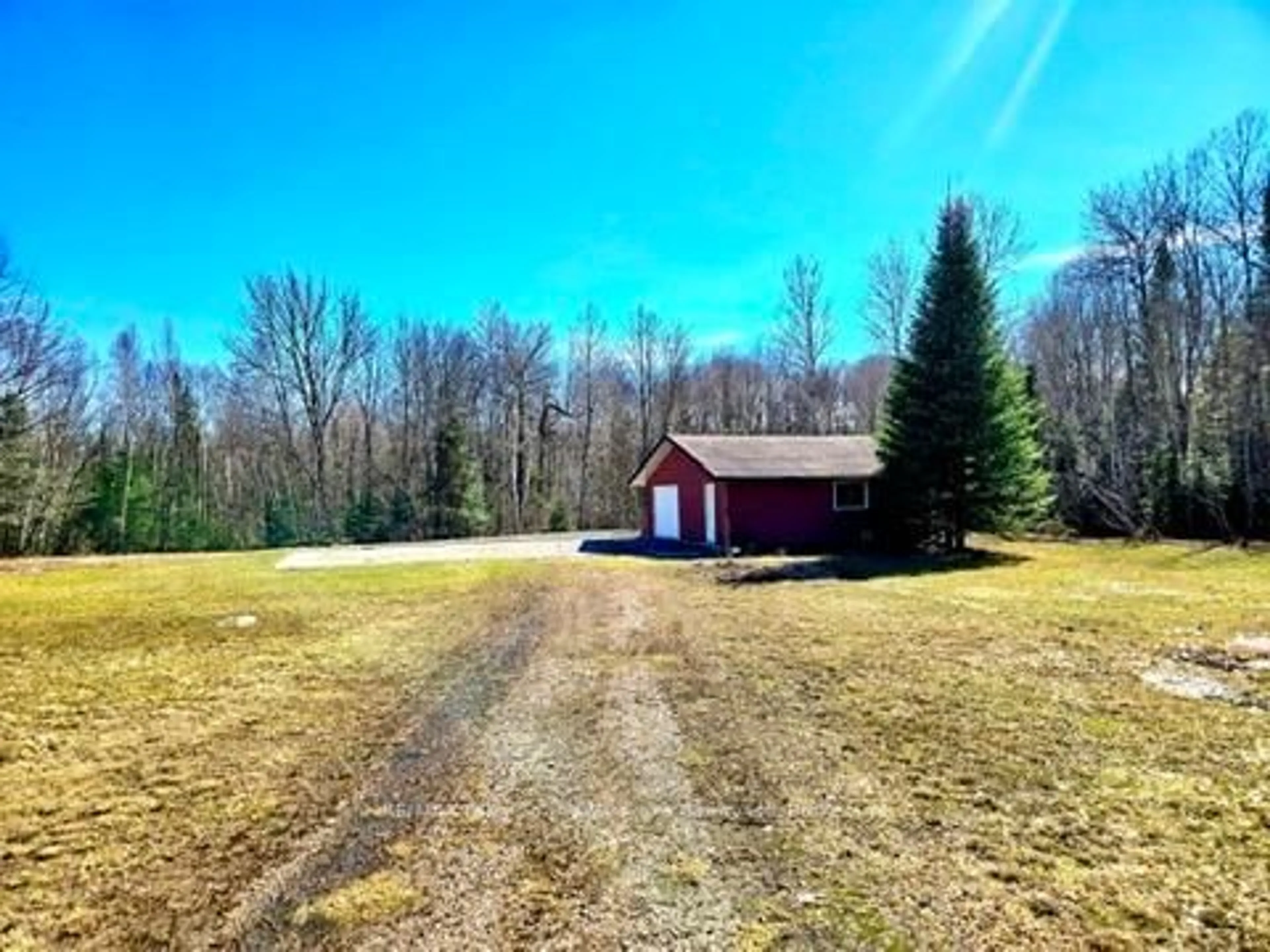 A pic from outside/outdoor area/front of a property/back of a property/a pic from drone, unknown for 50 Woods Rd, Carling Ontario P0G 1G0
