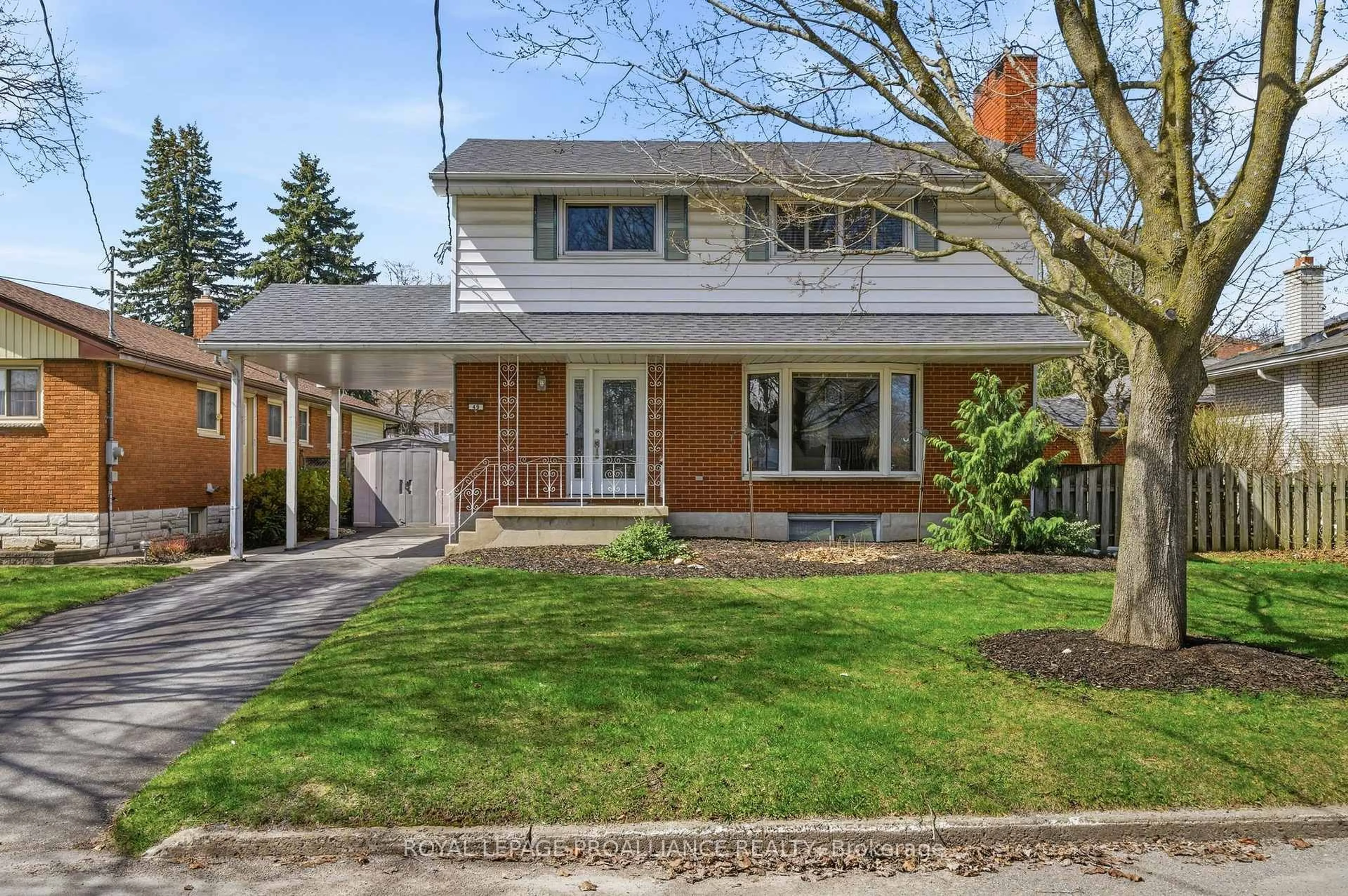 Home with brick exterior material, street for 49 Plaza Sq, Belleville Ontario K8N 4J2