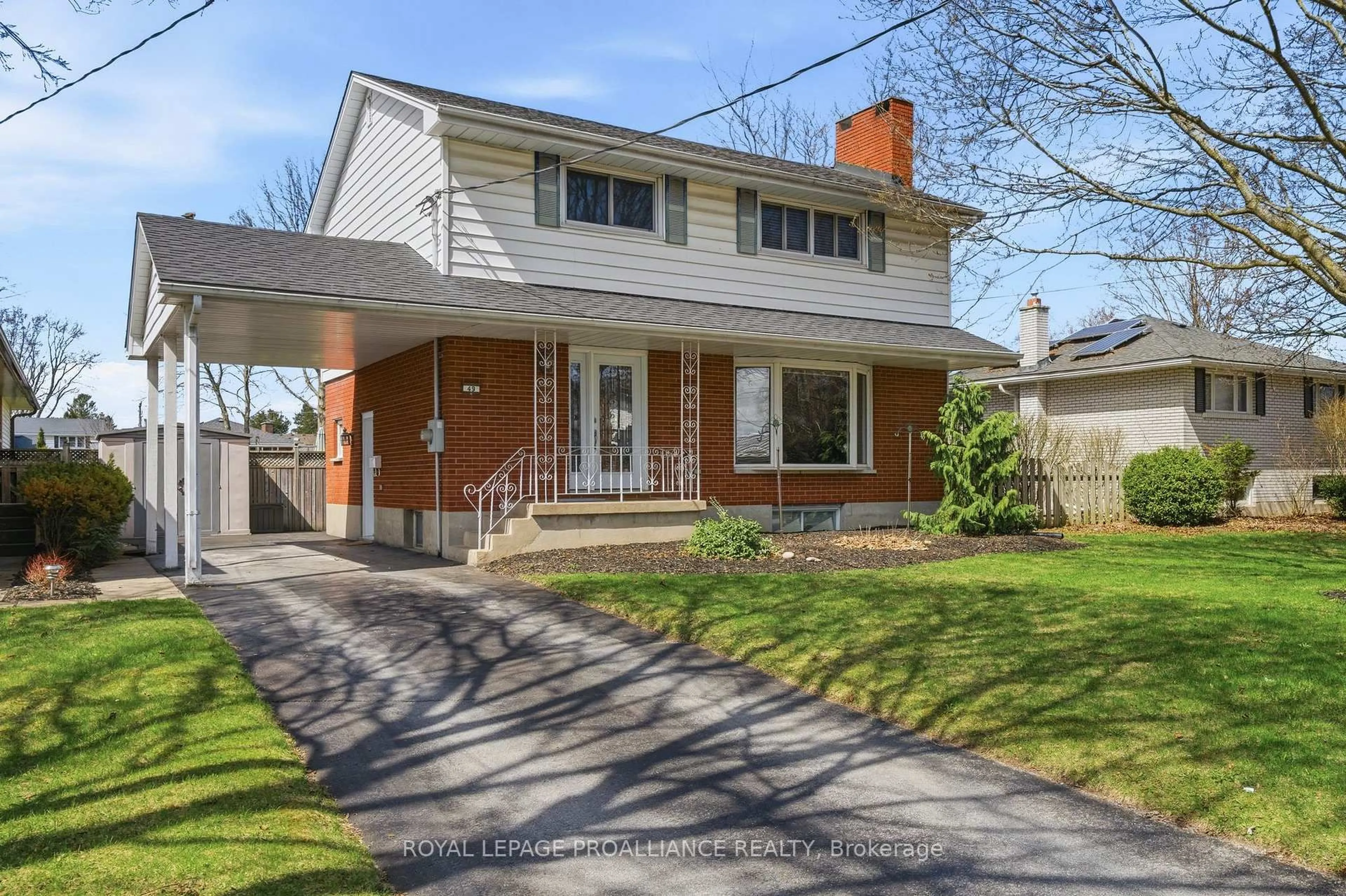 Home with brick exterior material, street for 49 Plaza Sq, Belleville Ontario K8N 4J2