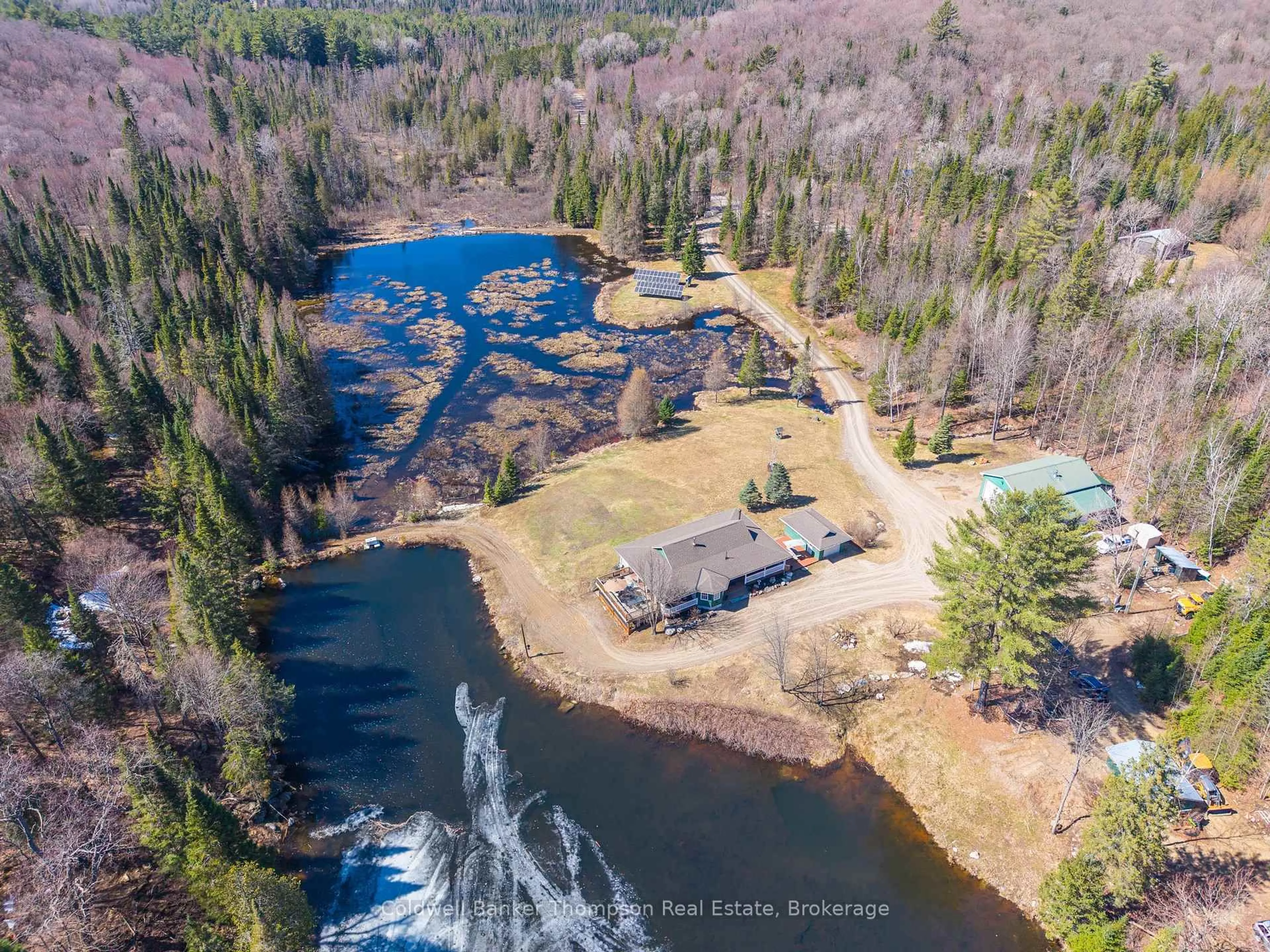 A pic from outside/outdoor area/front of a property/back of a property/a pic from drone, water/lake/river/ocean view for 448 Long Lake Rd, Perry Ontario P0A 1R0