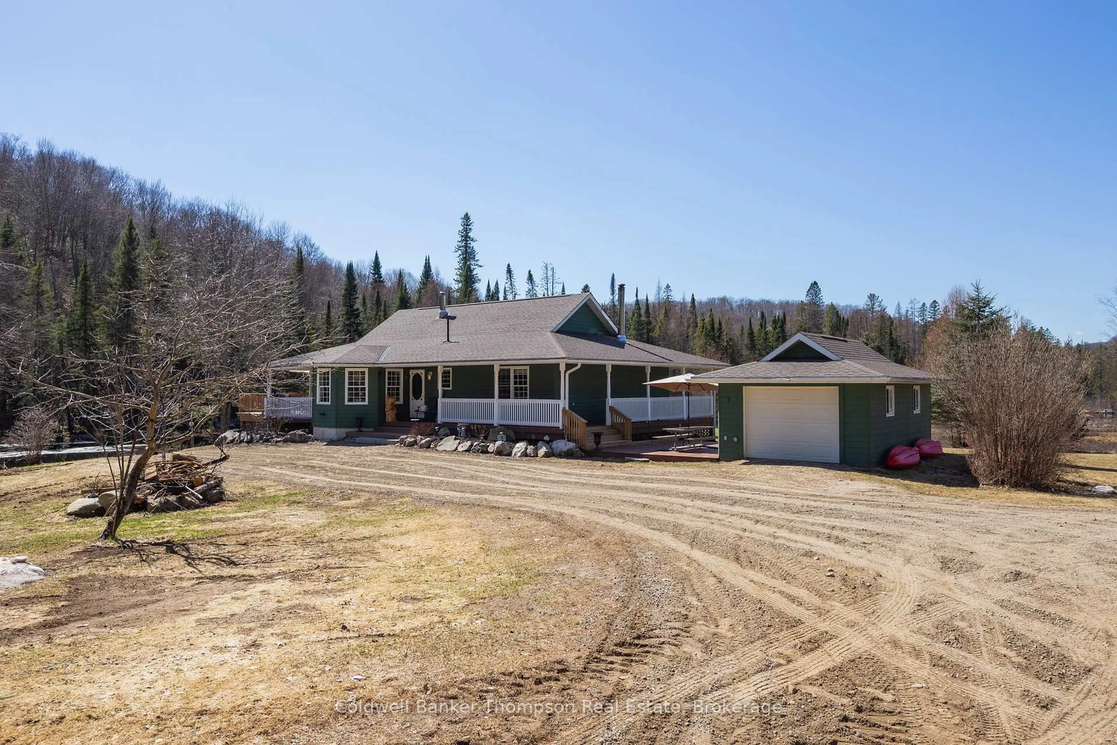 A pic from outside/outdoor area/front of a property/back of a property/a pic from drone, unknown for 448 Long Lake Rd, Perry Ontario P0A 1R0
