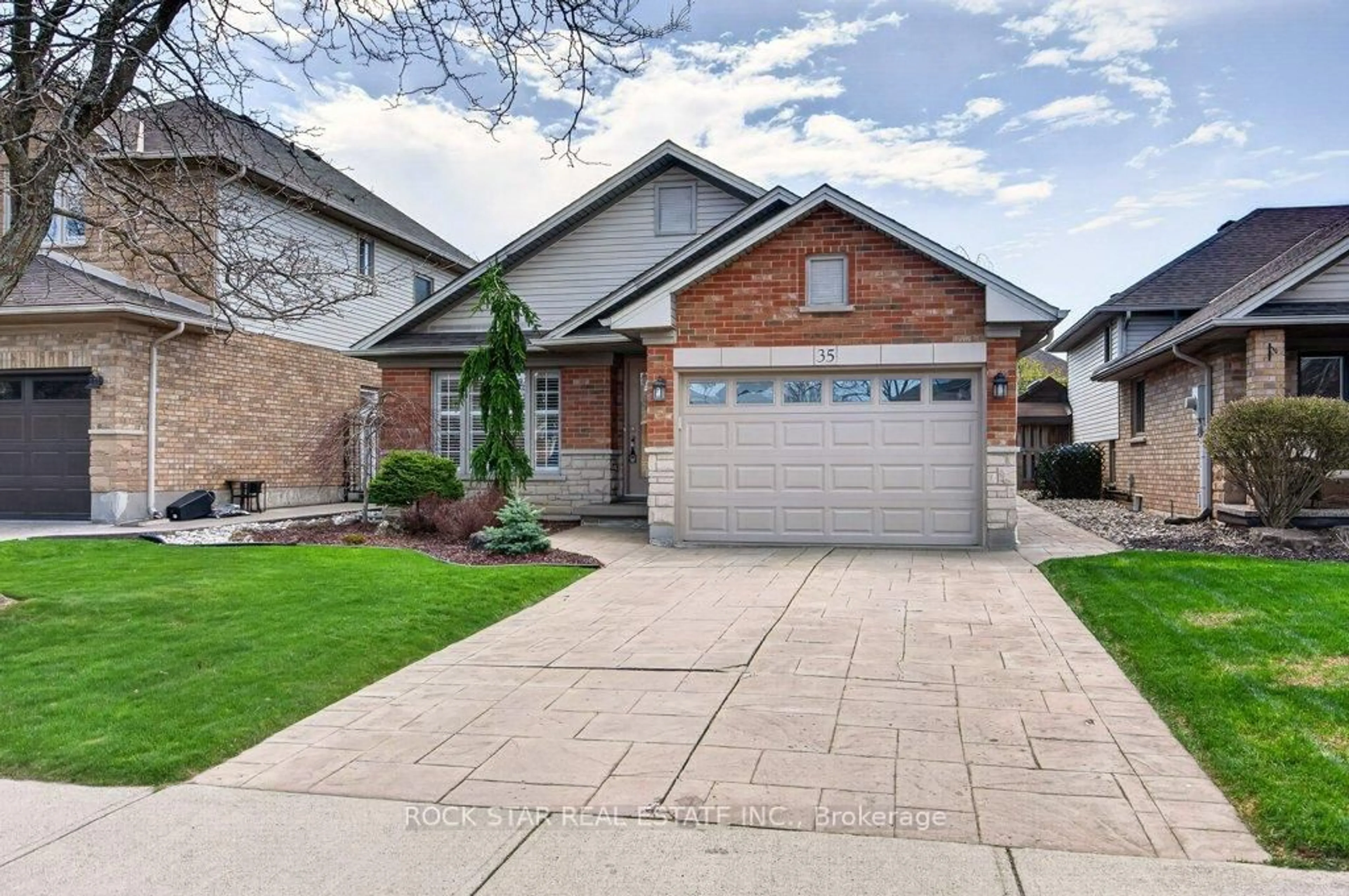 Home with brick exterior material, street for 35 Hepburn Cres, Hamilton Ontario L9C 7S4