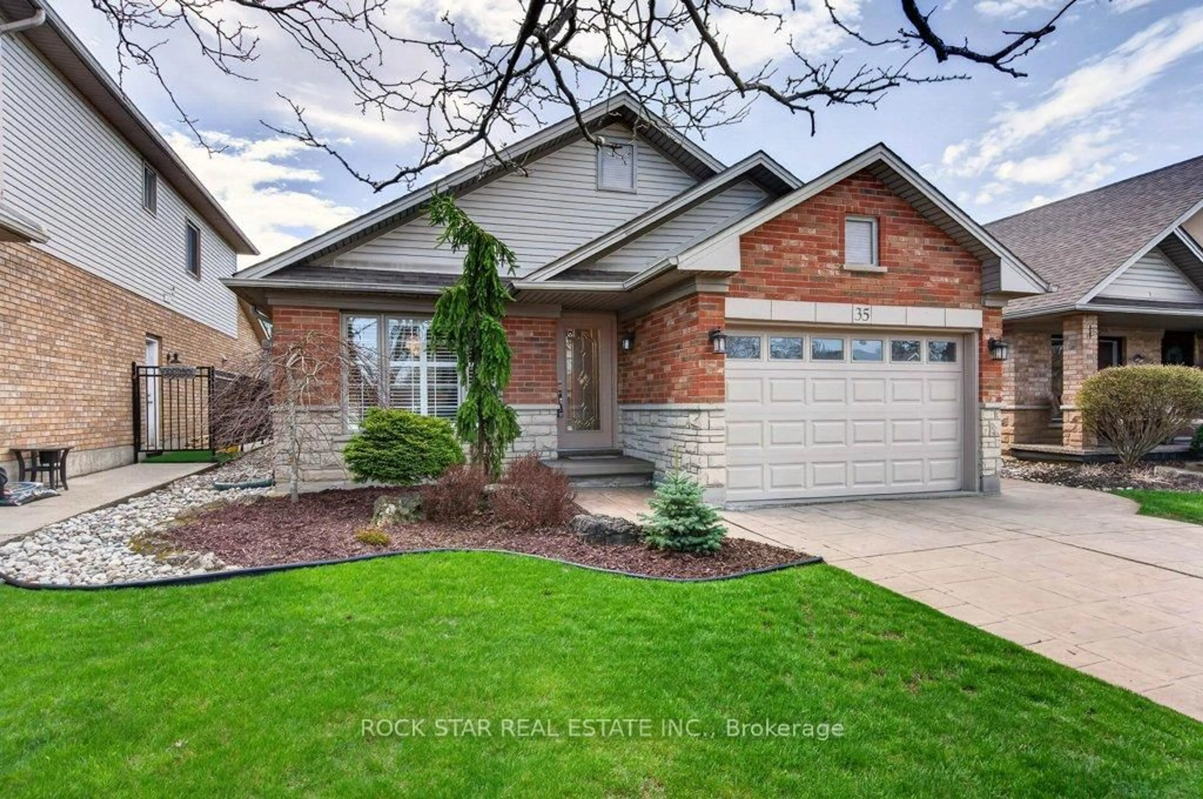 Home with brick exterior material, street for 35 Hepburn Cres, Hamilton Ontario L9C 7S4