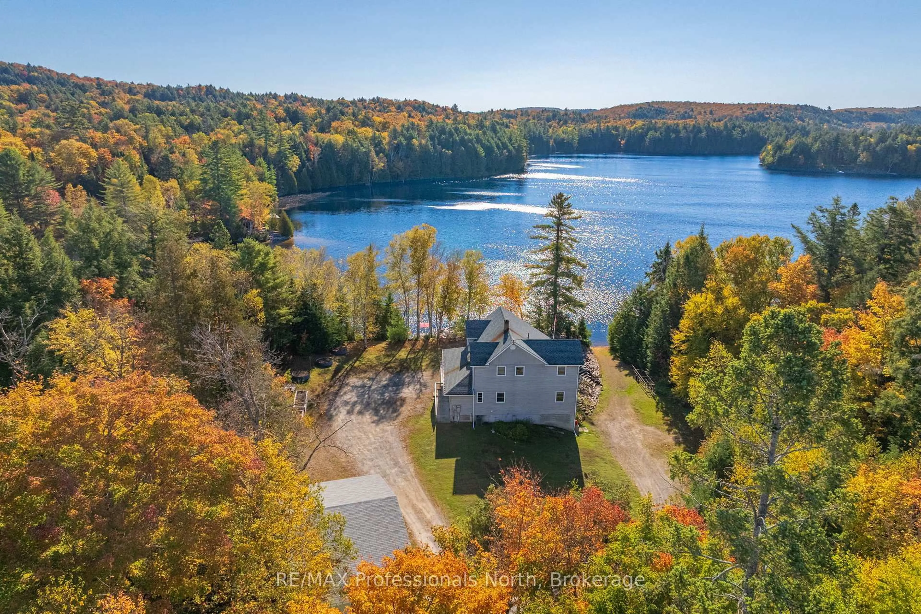 A pic from outside/outdoor area/front of a property/back of a property/a pic from drone, water/lake/river/ocean view for 2901 Limberlost Rd #3, Lake of Bays Ontario P1H 2J6