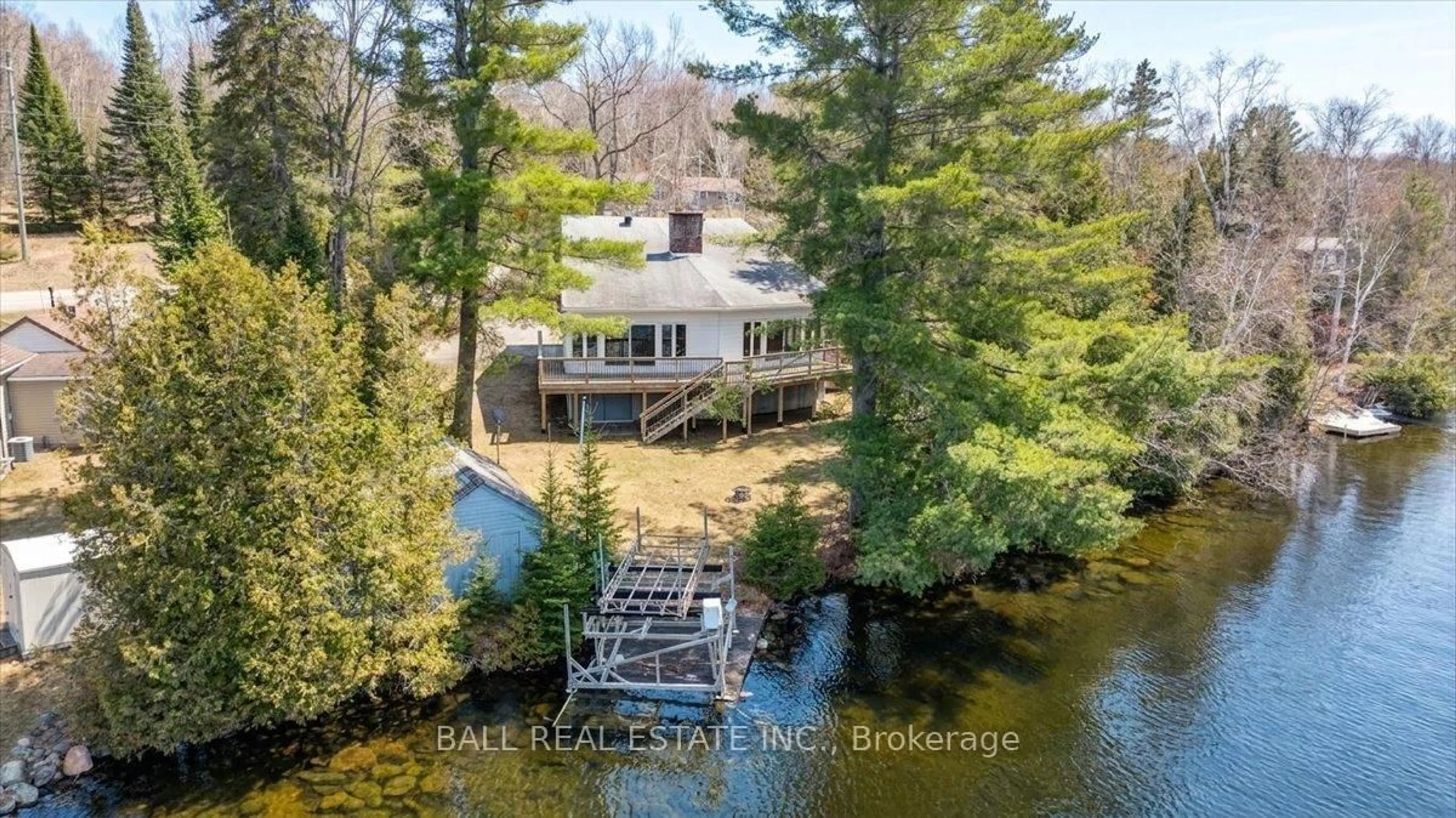 A pic from outside/outdoor area/front of a property/back of a property/a pic from drone, water/lake/river/ocean view for 27435 Highway 28, Bancroft Ontario K0L 1C0