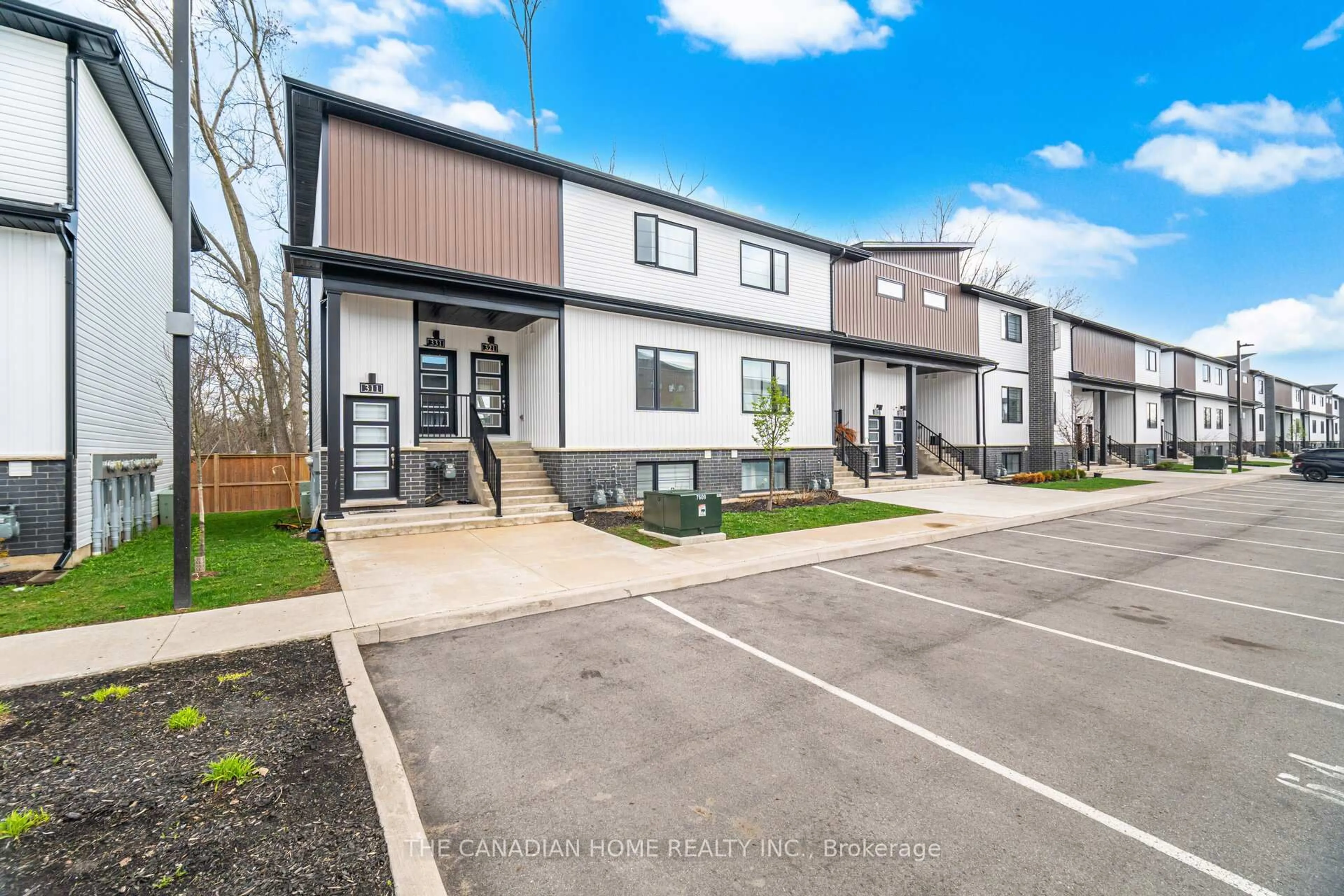 A pic from outside/outdoor area/front of a property/back of a property/a pic from drone, street for 4263 FOURTH Ave #321, Niagara Falls Ontario L2E 0C2