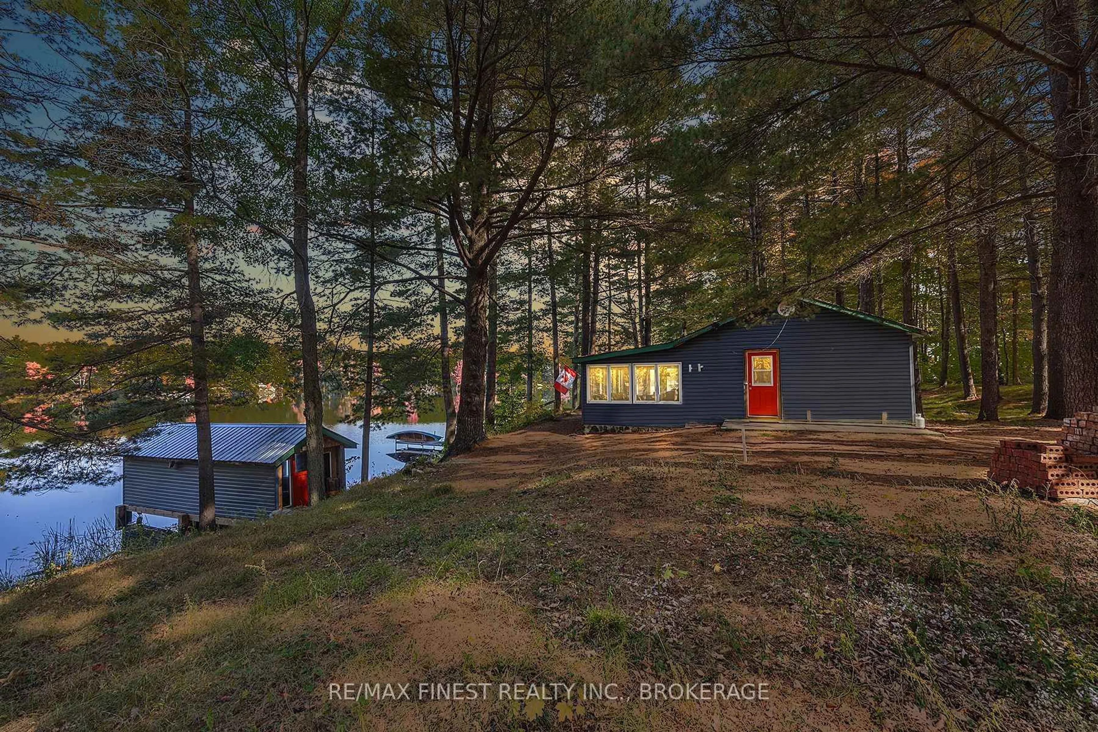 A pic from outside/outdoor area/front of a property/back of a property/a pic from drone, water/lake/river/ocean view for 293 GOLD DUST Lane, Hartington Ontario K0H 1W0
