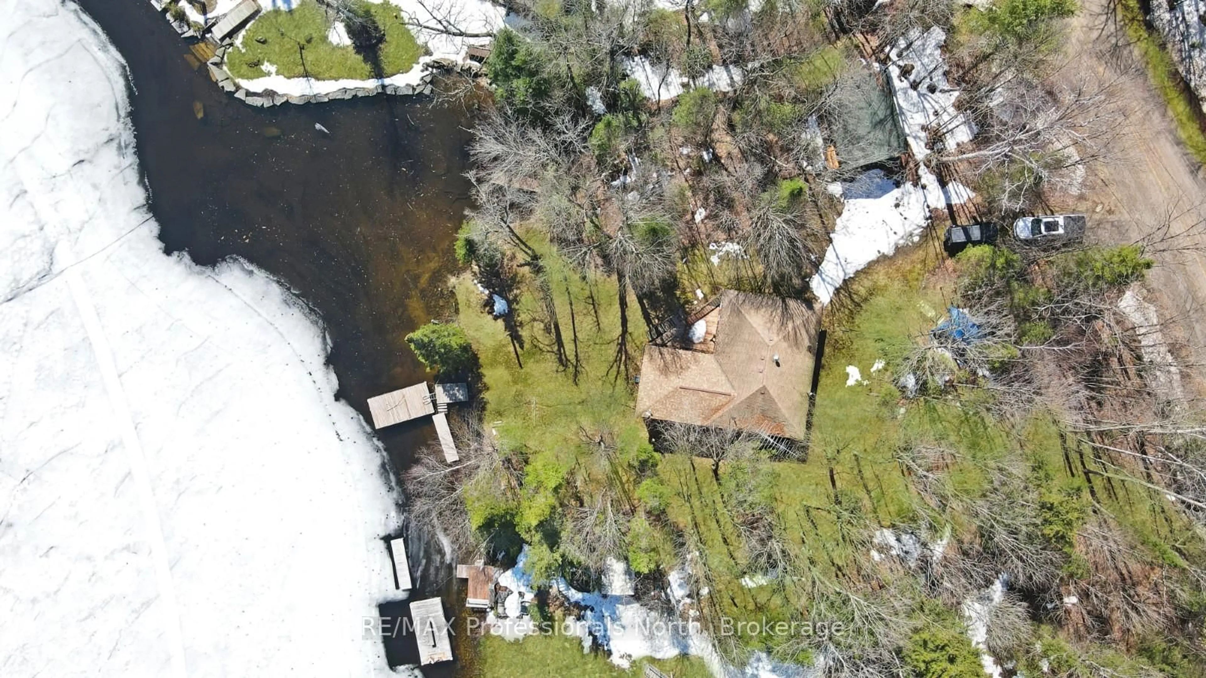 A pic from outside/outdoor area/front of a property/back of a property/a pic from drone, water/lake/river/ocean view for 3382 Kushog Lake Rd, Algonquin Highlands Ontario K0M 1S0