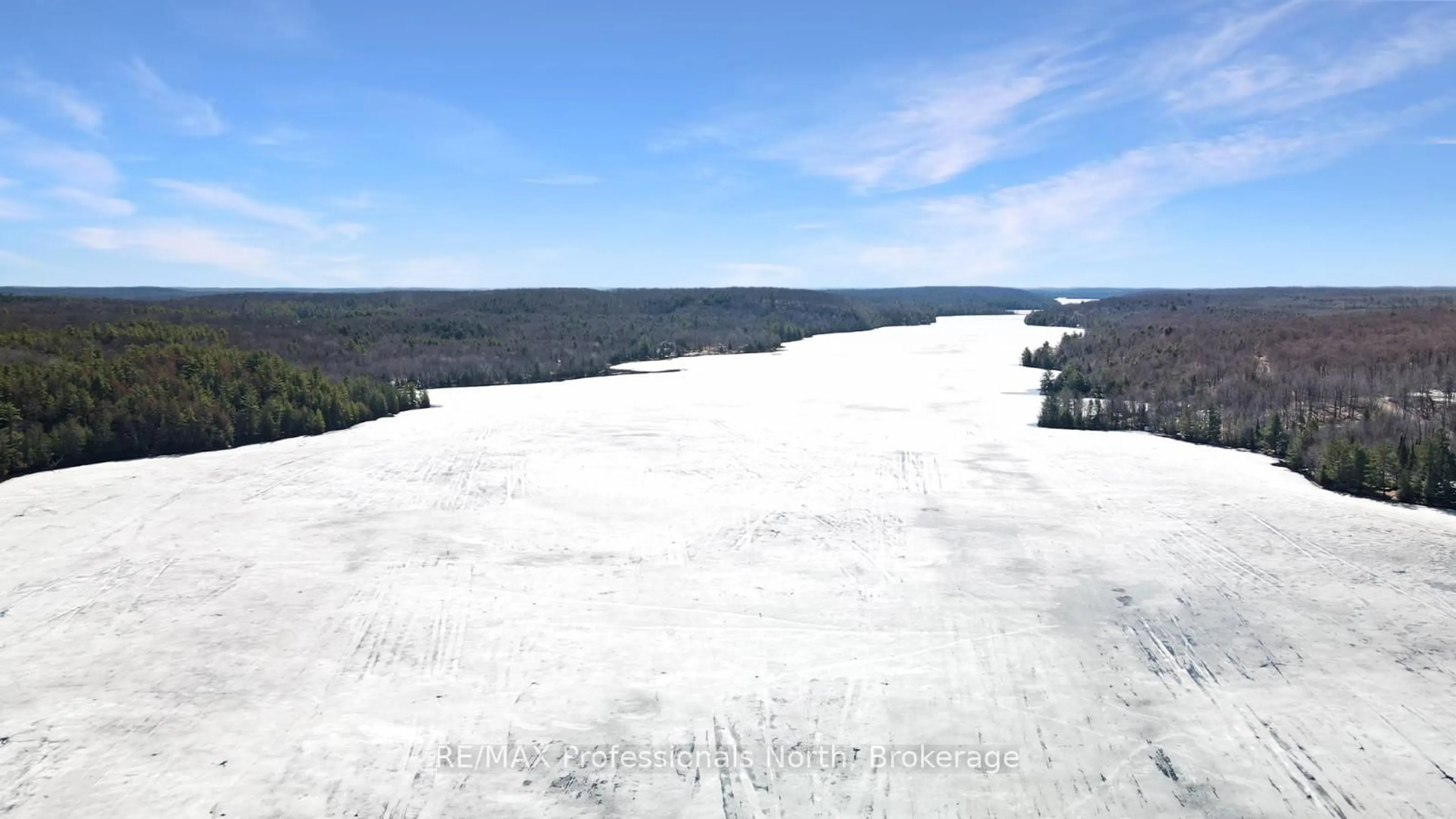 A pic from outside/outdoor area/front of a property/back of a property/a pic from drone, water/lake/river/ocean view for 3382 Kushog Lake Rd, Algonquin Highlands Ontario K0M 1S0