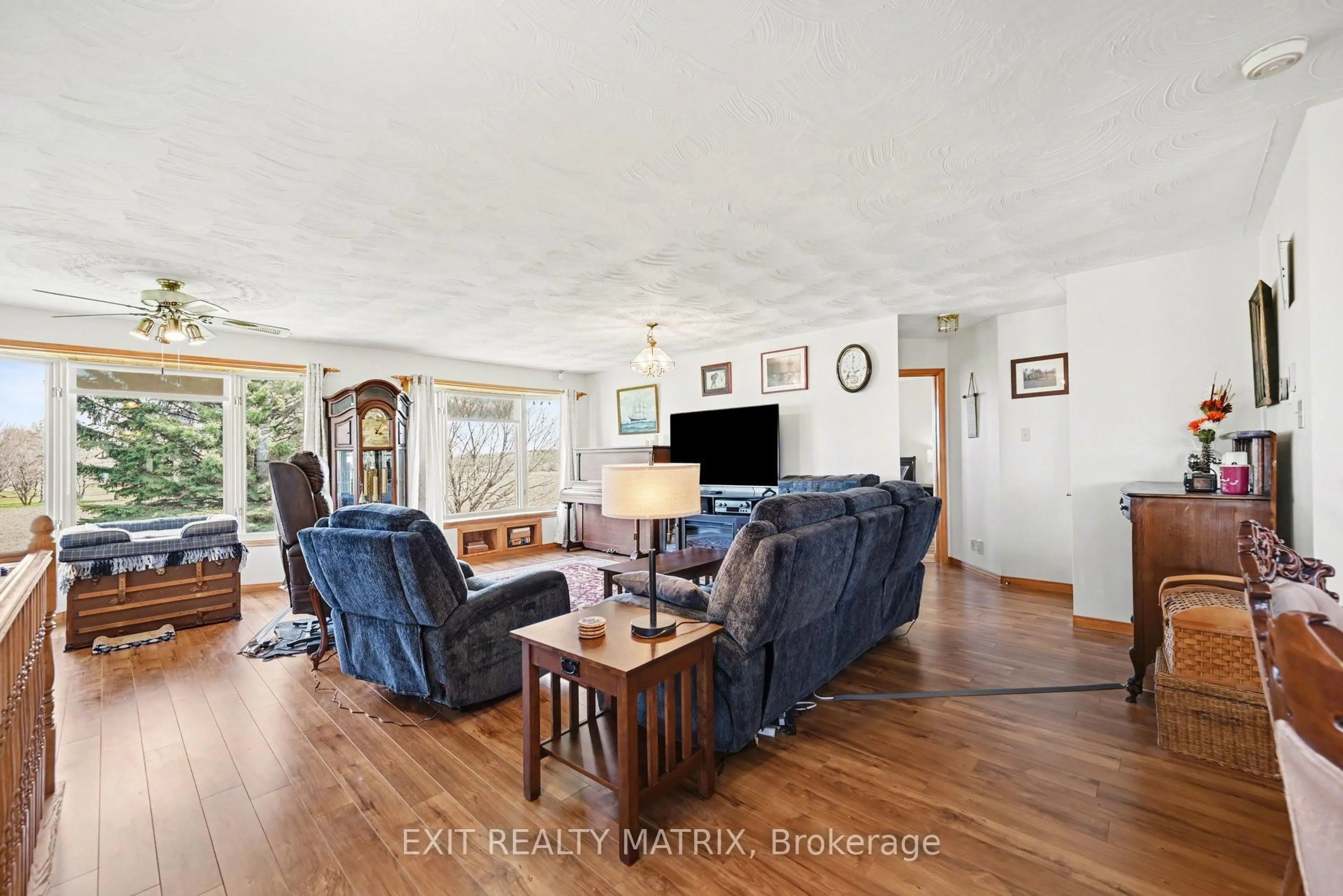 Living room with furniture, wood/laminate floor for 14676 County 43 Rd, North Stormont Ontario K0C 1K0