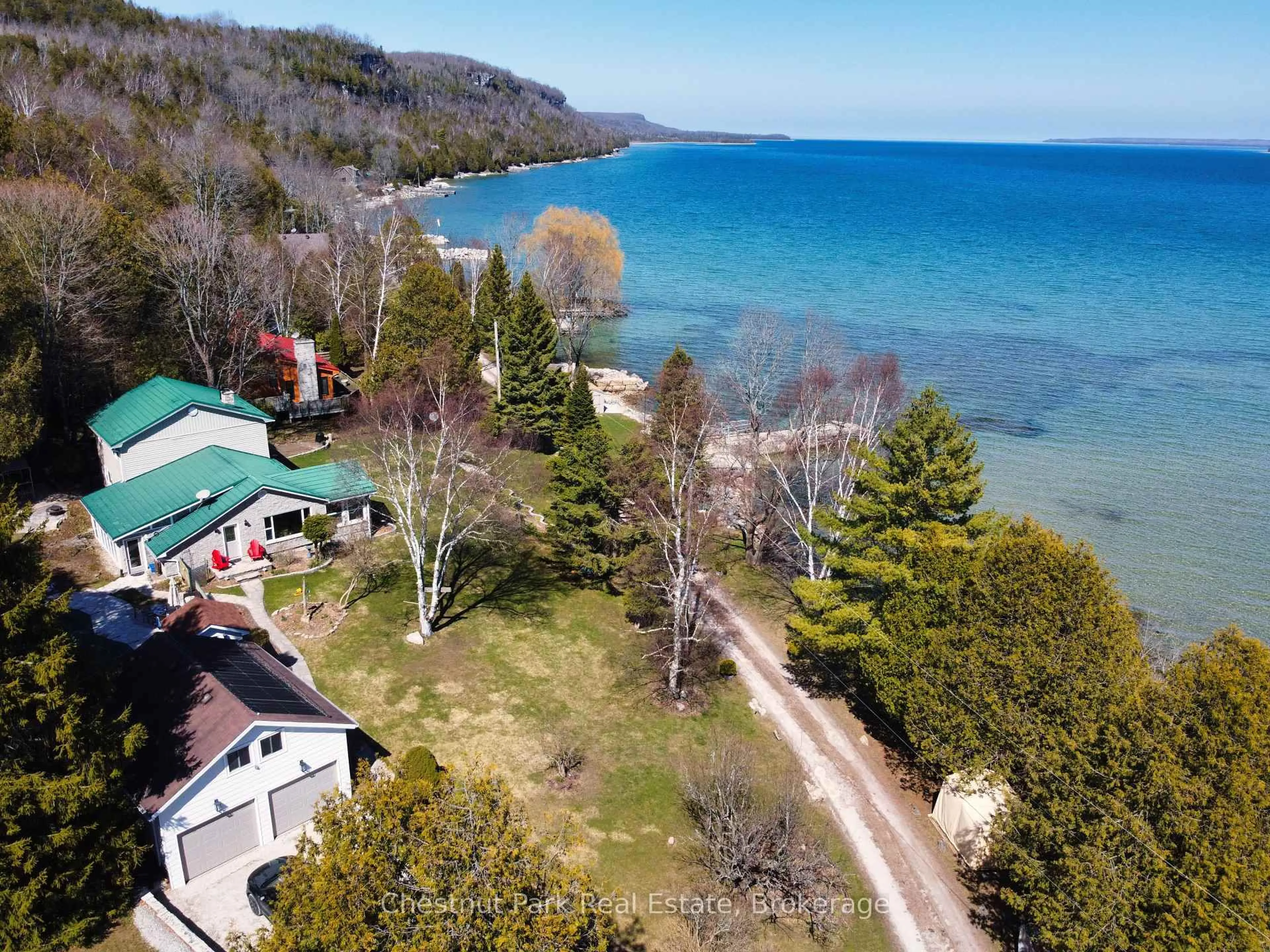 A pic from outside/outdoor area/front of a property/back of a property/a pic from drone, water/lake/river/ocean view for 47 Water St, Northern Bruce Peninsula Ontario N0H 2T0