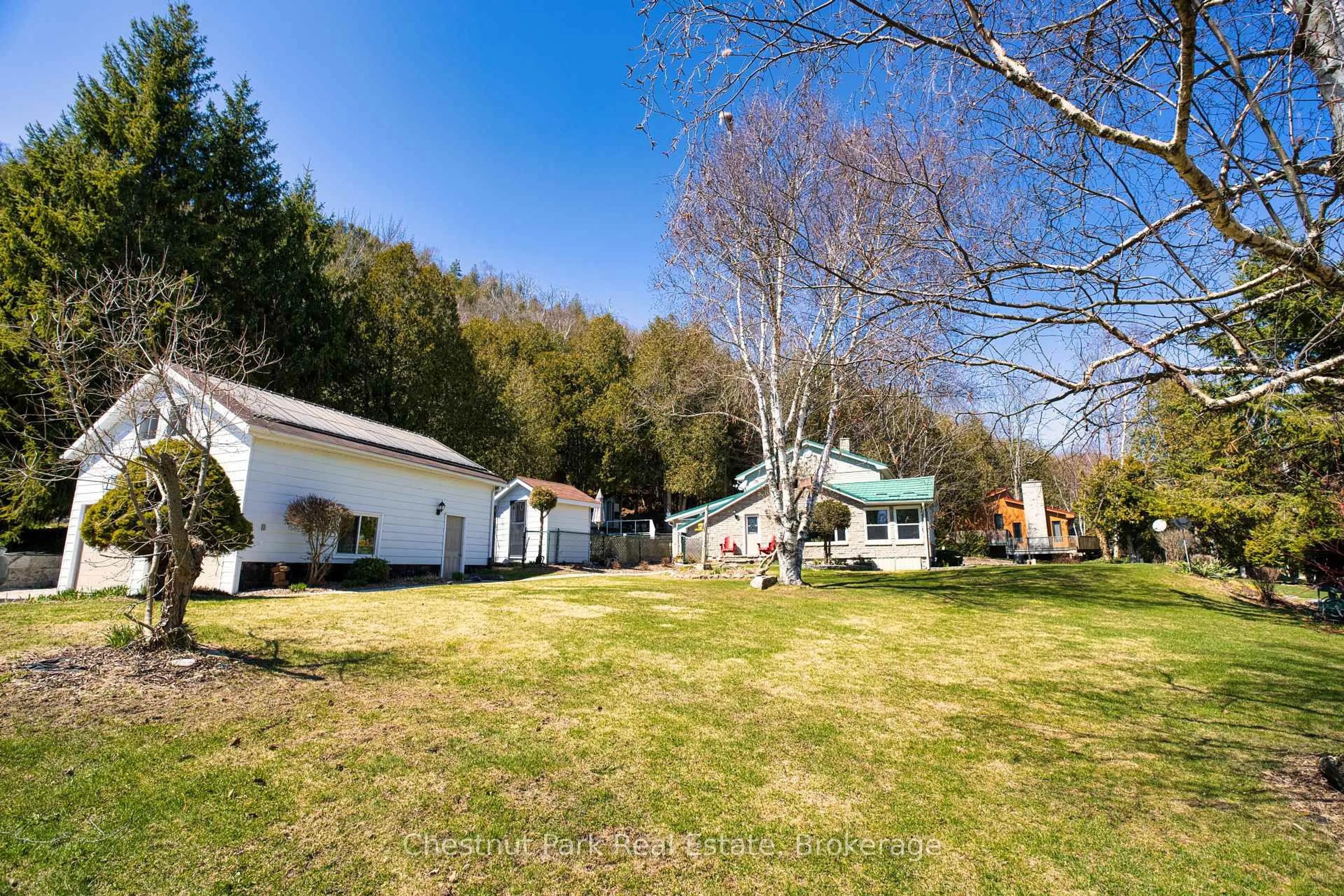 A pic from outside/outdoor area/front of a property/back of a property/a pic from drone, mountain view for 47 Water St, Northern Bruce Peninsula Ontario N0H 2T0