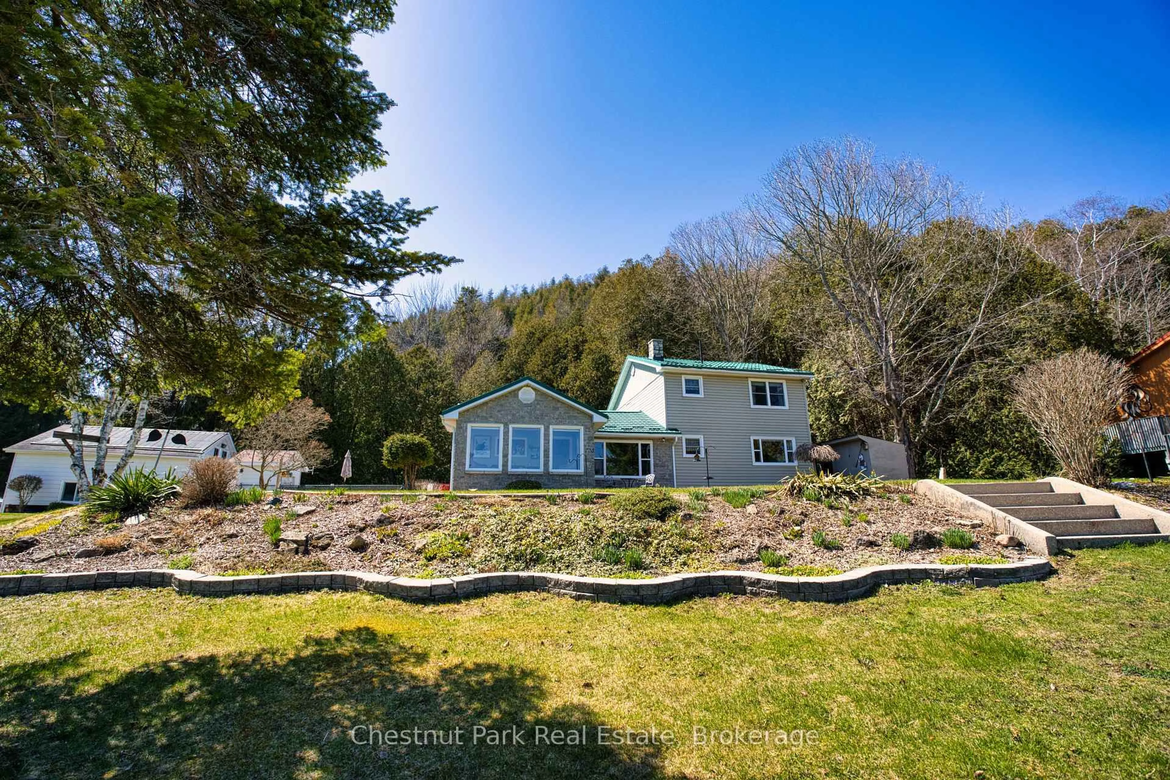 A pic from outside/outdoor area/front of a property/back of a property/a pic from drone, water/lake/river/ocean view for 47 Water St, Northern Bruce Peninsula Ontario N0H 2T0