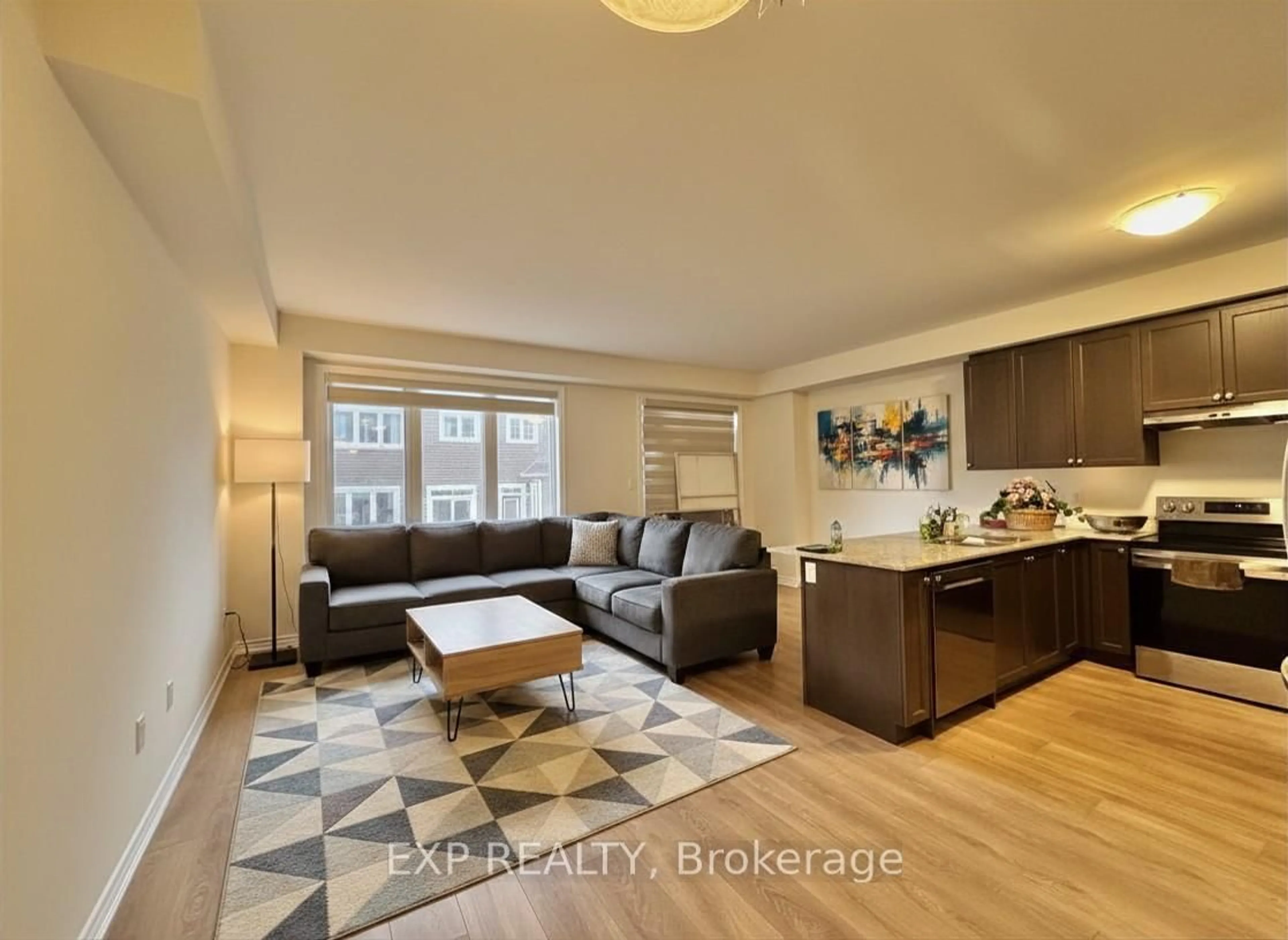 Living room with furniture, wood/laminate floor for 107 Mcgill Ave, Erin Ontario N0B 1T0