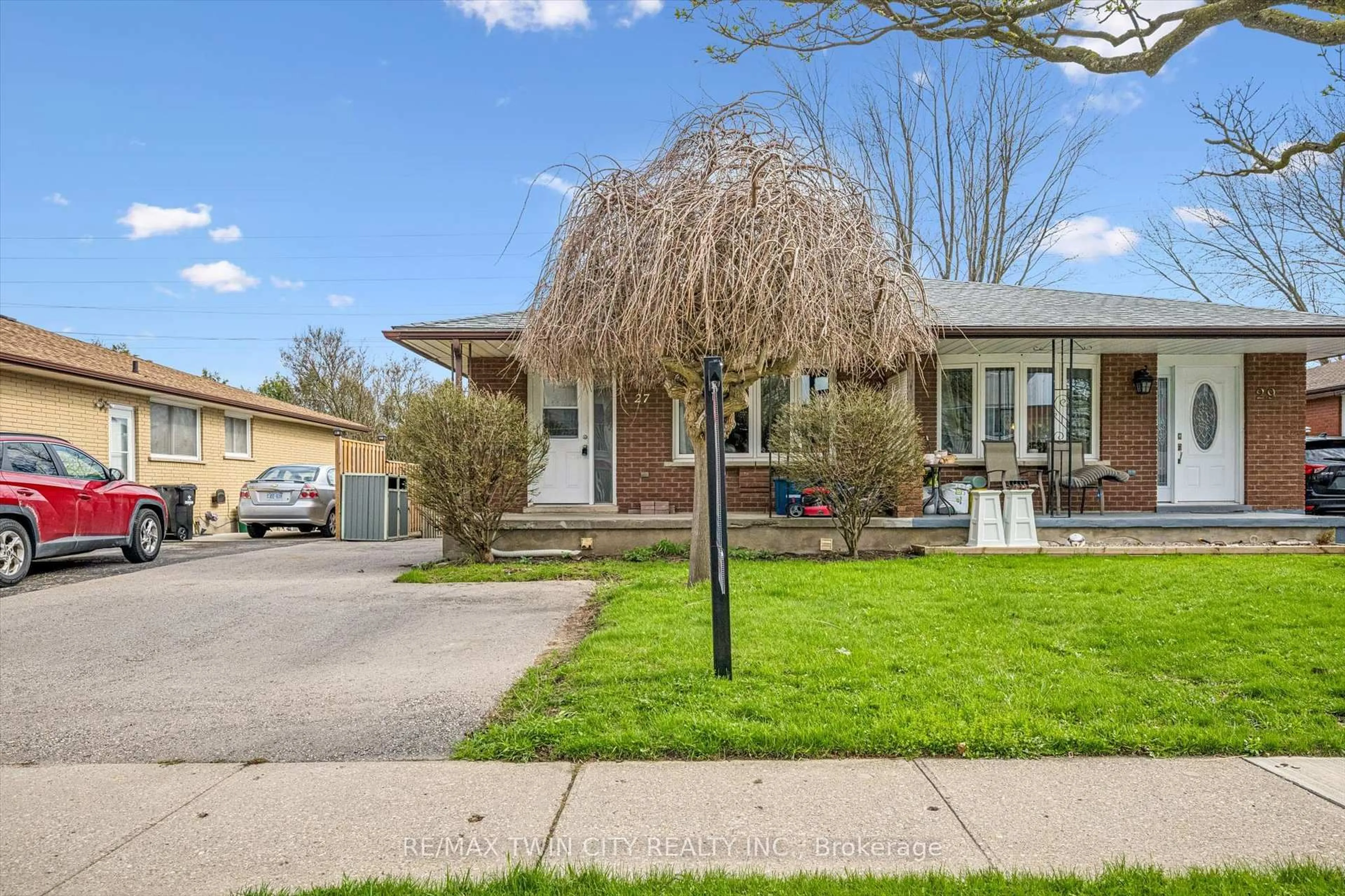 Home with brick exterior material, street for 27 Vicmount Dr, Kitchener Ontario N2M 2A2