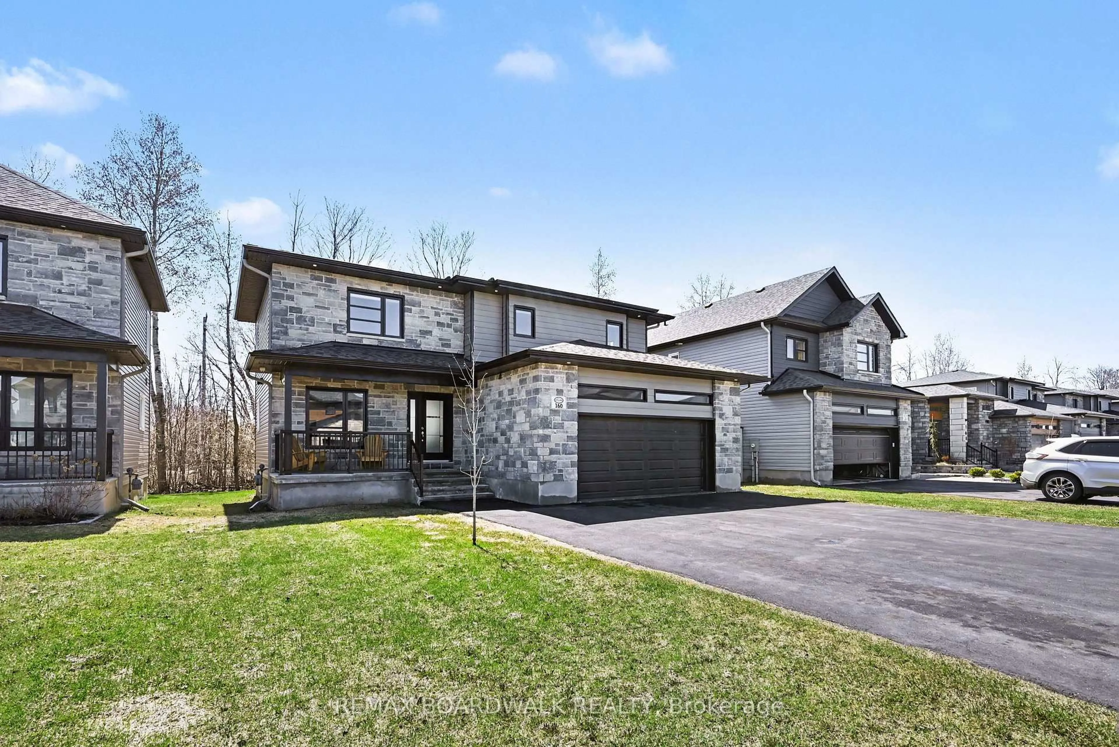 Home with brick exterior material, street for 160 Hybrid St, Russell Ontario K0A 1W0