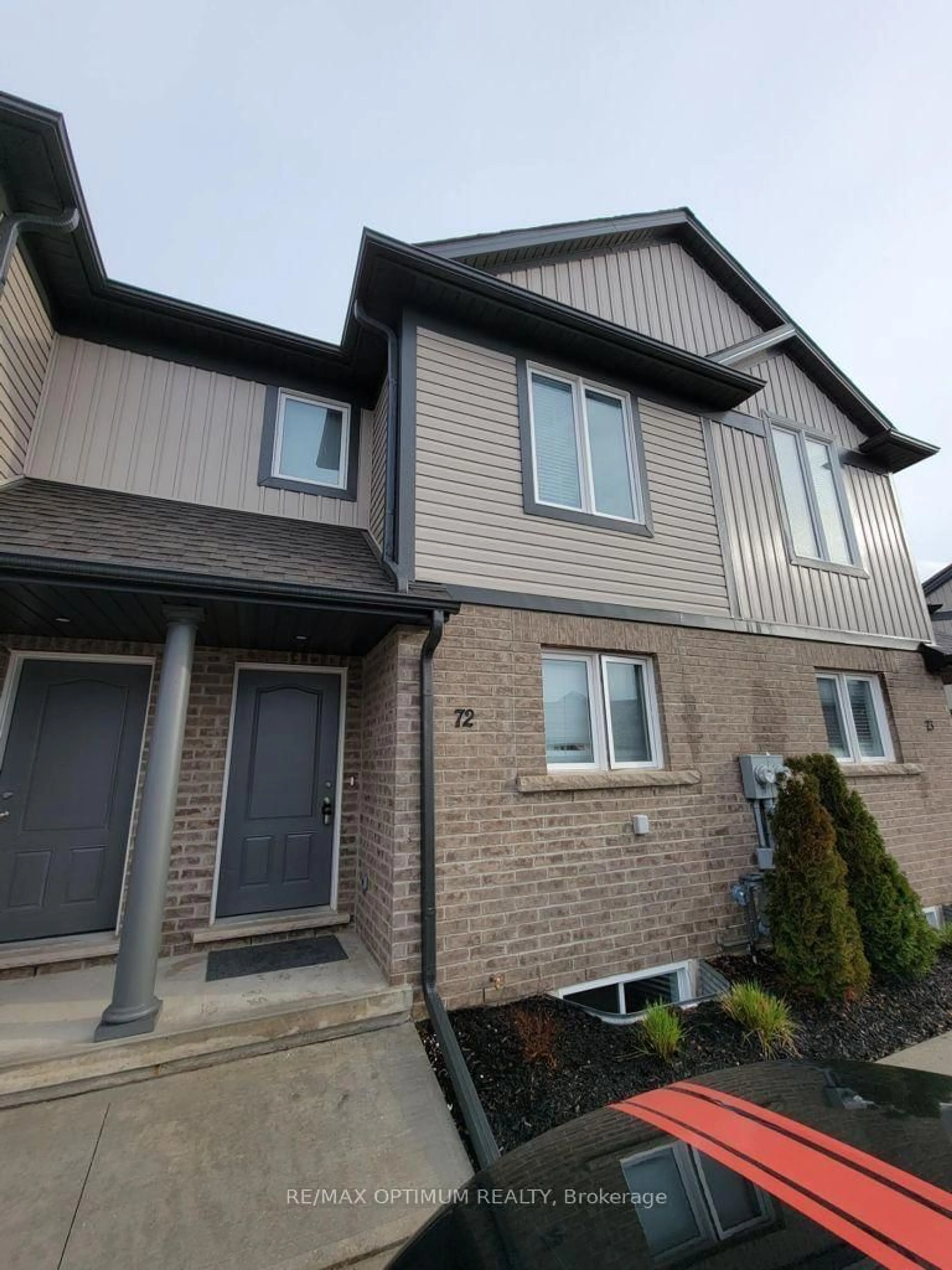 Home with brick exterior material, street for 7768 Ascot Circ #72, Niagara Falls Ontario L2H 3P9