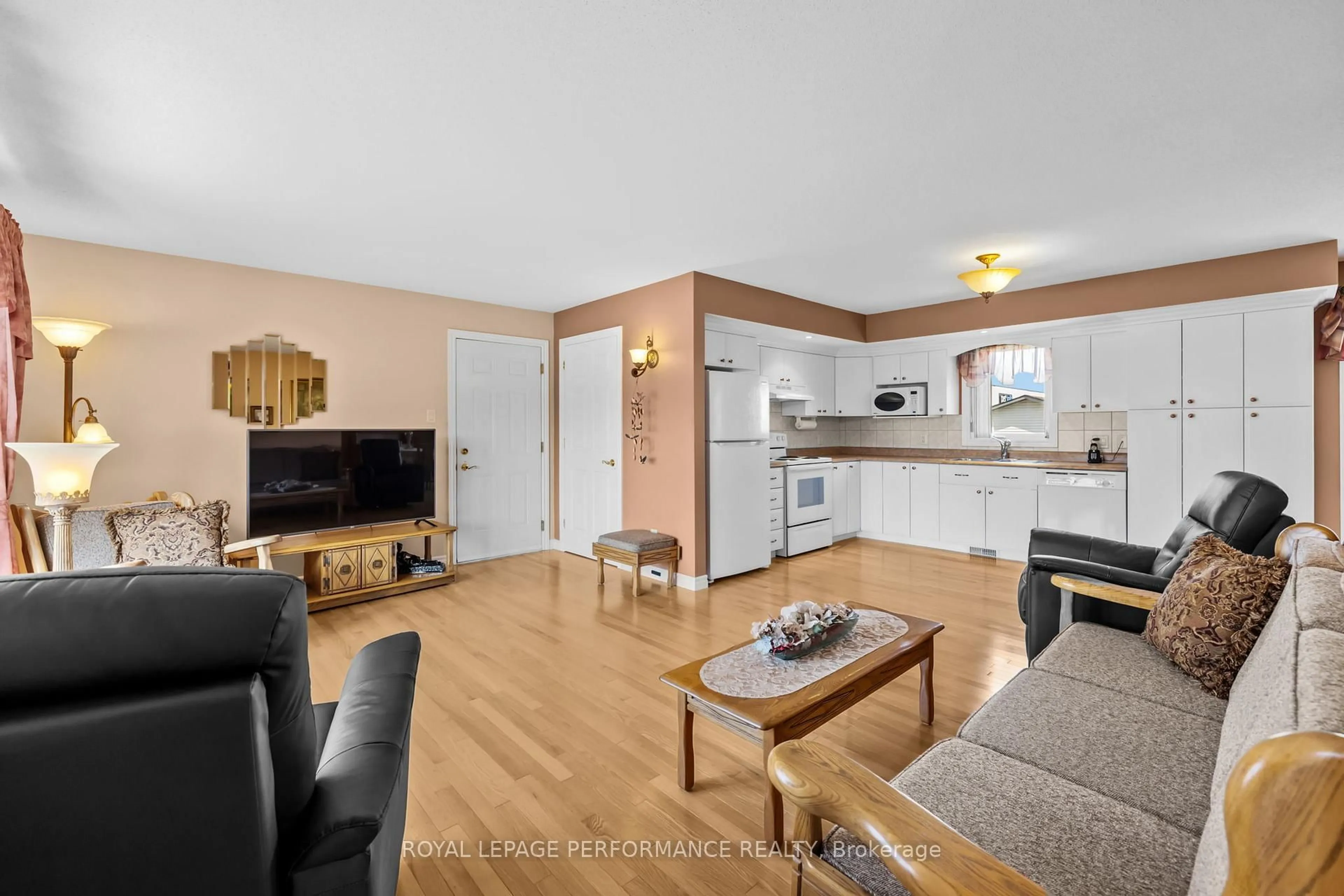 Living room with furniture, wood/laminate floor for 71 Faucher Blvd, Casselman Ontario K0A 1M0