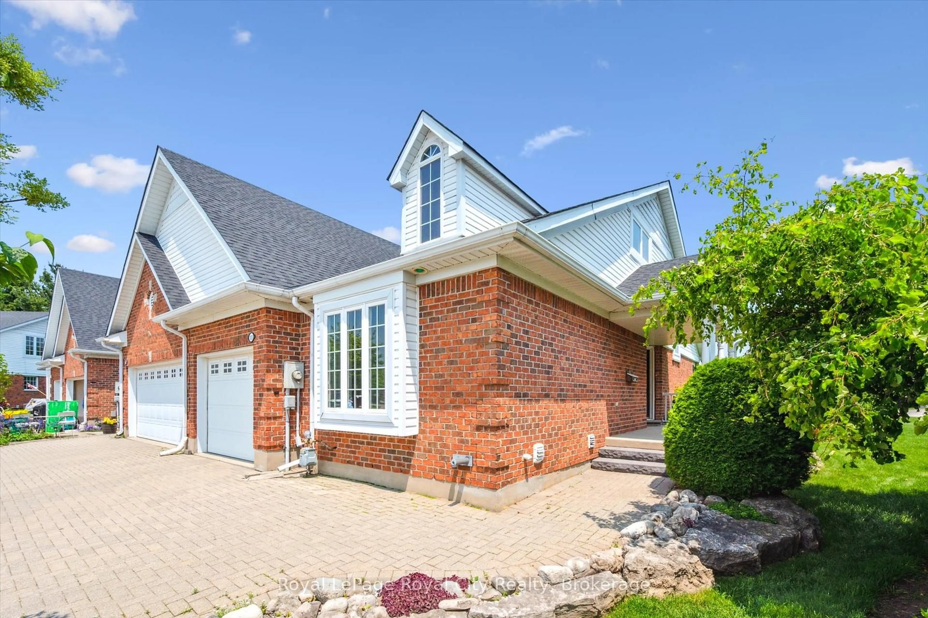 Home with brick exterior material, street for 105 Riverwalk Pl, Guelph/Eramosa Ontario N0B 2K0